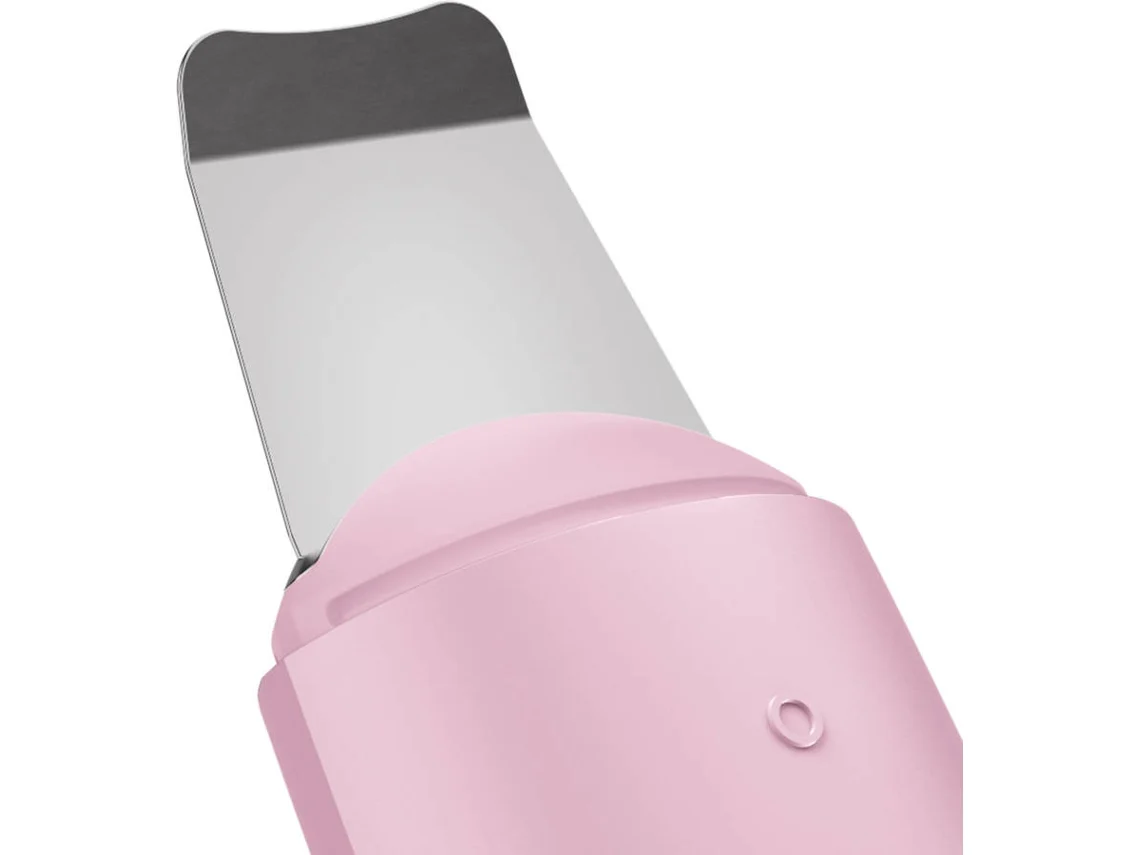 Un dispositivo rosa con una cuchilla plateada, el enfoque está en la cuchilla y la carcasa rosa.