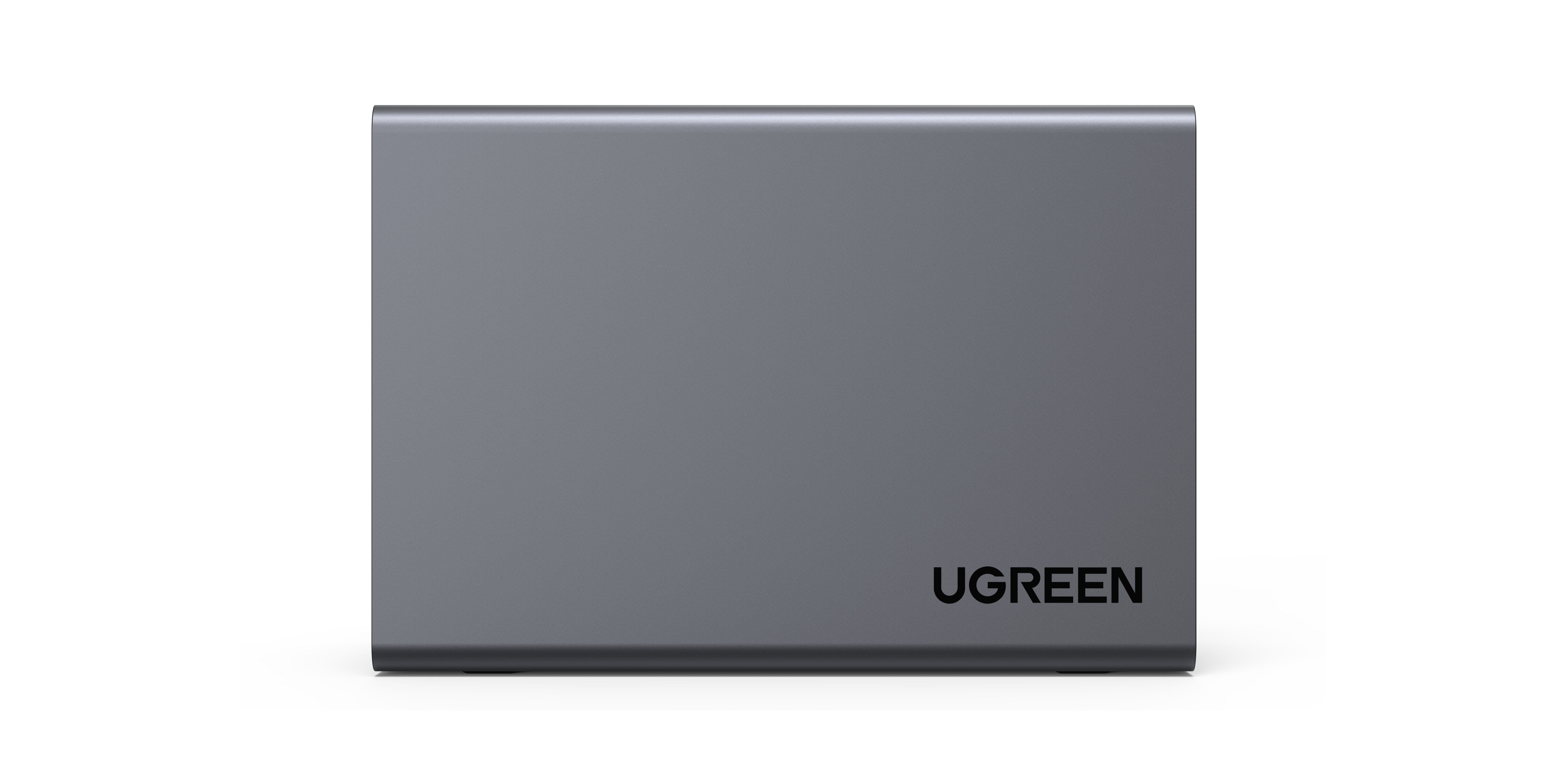Ein rechteckiges, graues UGREEN SSD-Gehäuse mit 'UGREEN' in Schwarz auf der Oberfläche.