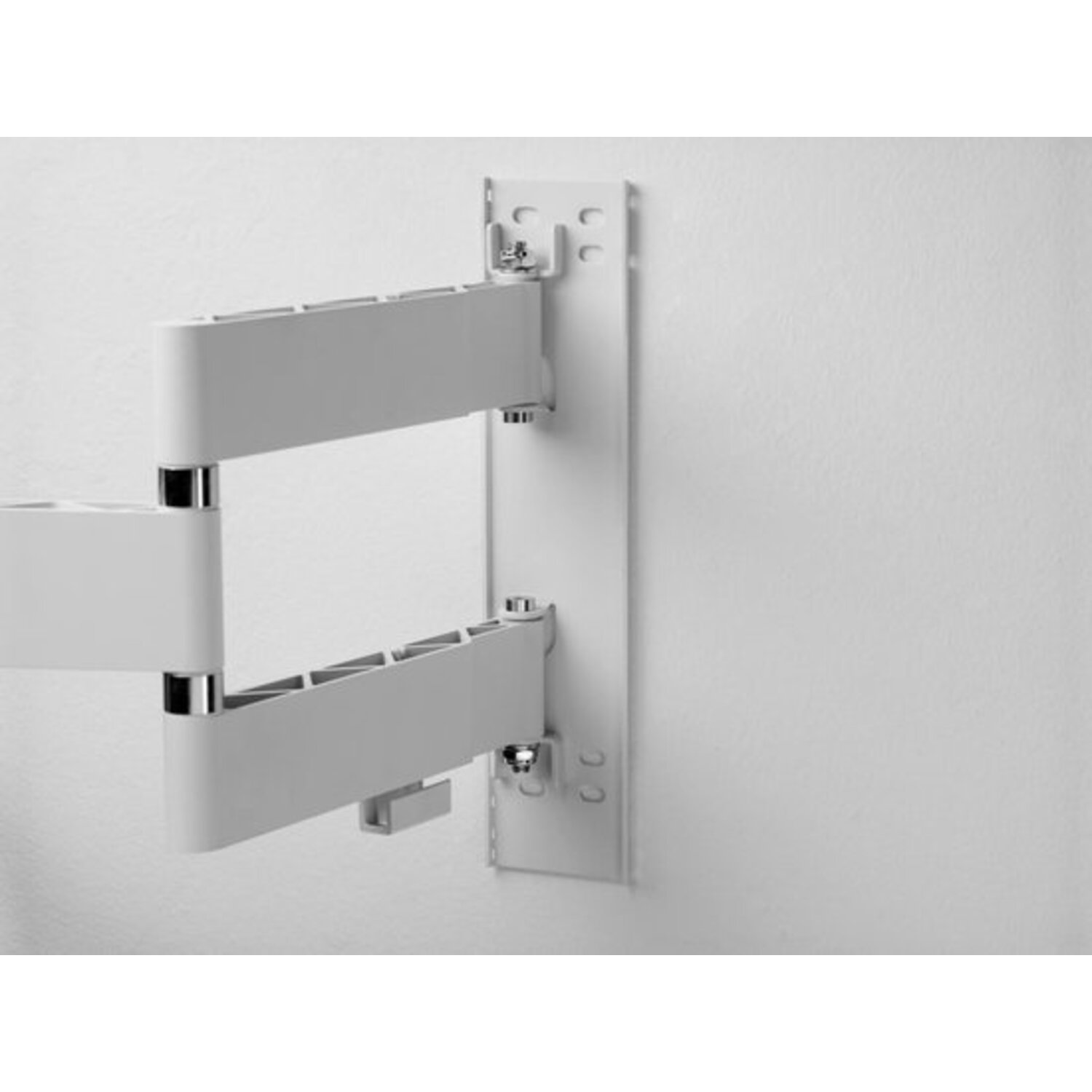 White TV mount mounted on a white wall, with a minimalist design.