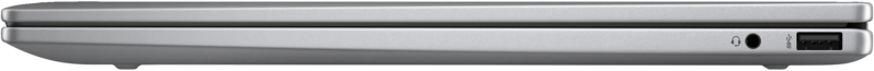 Ezüst laptop oldalsó profilja, fejhallgató- és USB-porttal.