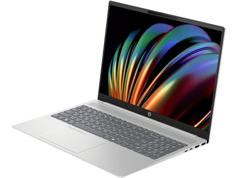 Ezüst laptop színes képernyővel. A háttér fekete.