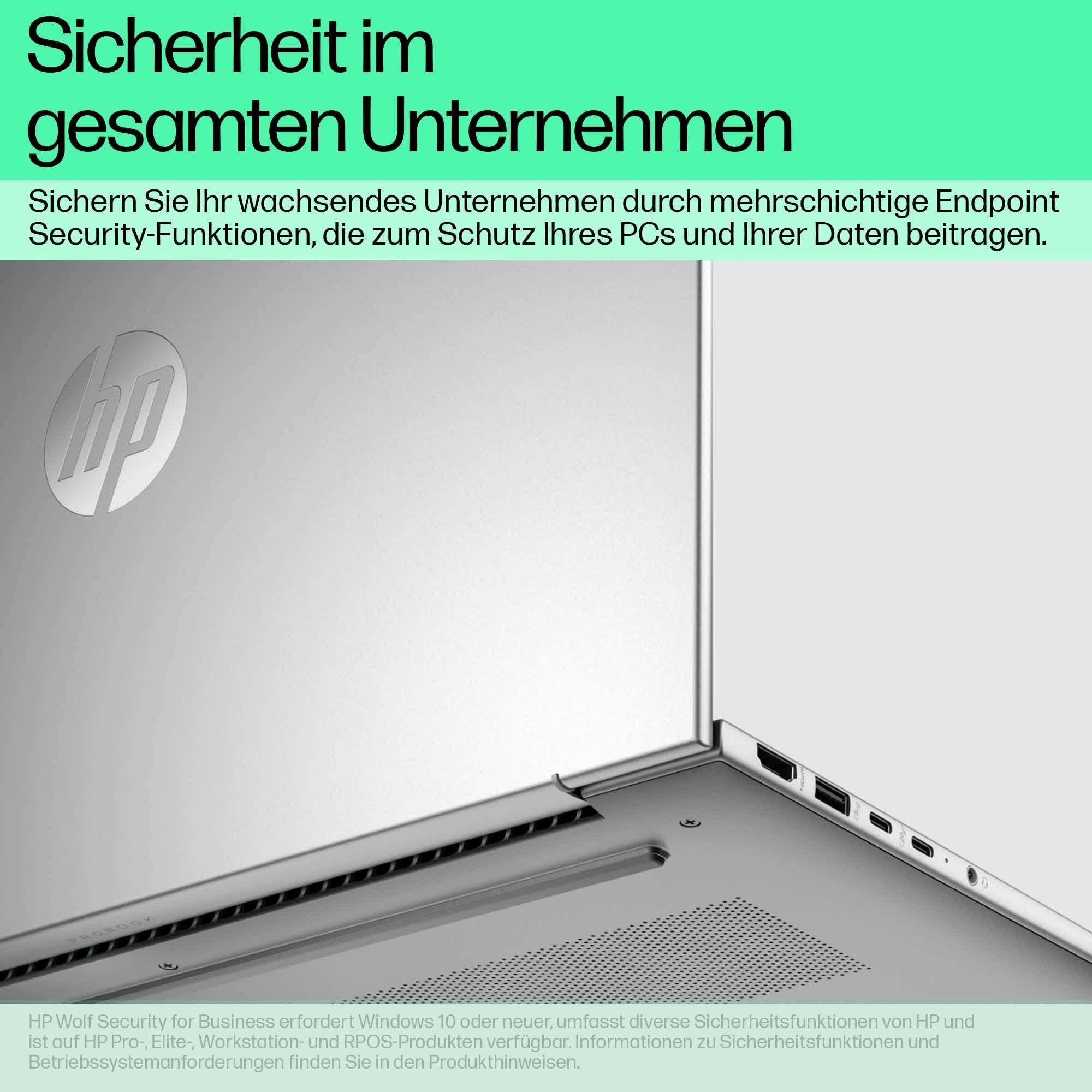 Hintere Ecke des Laptops mit Logo und Anschlüssen.