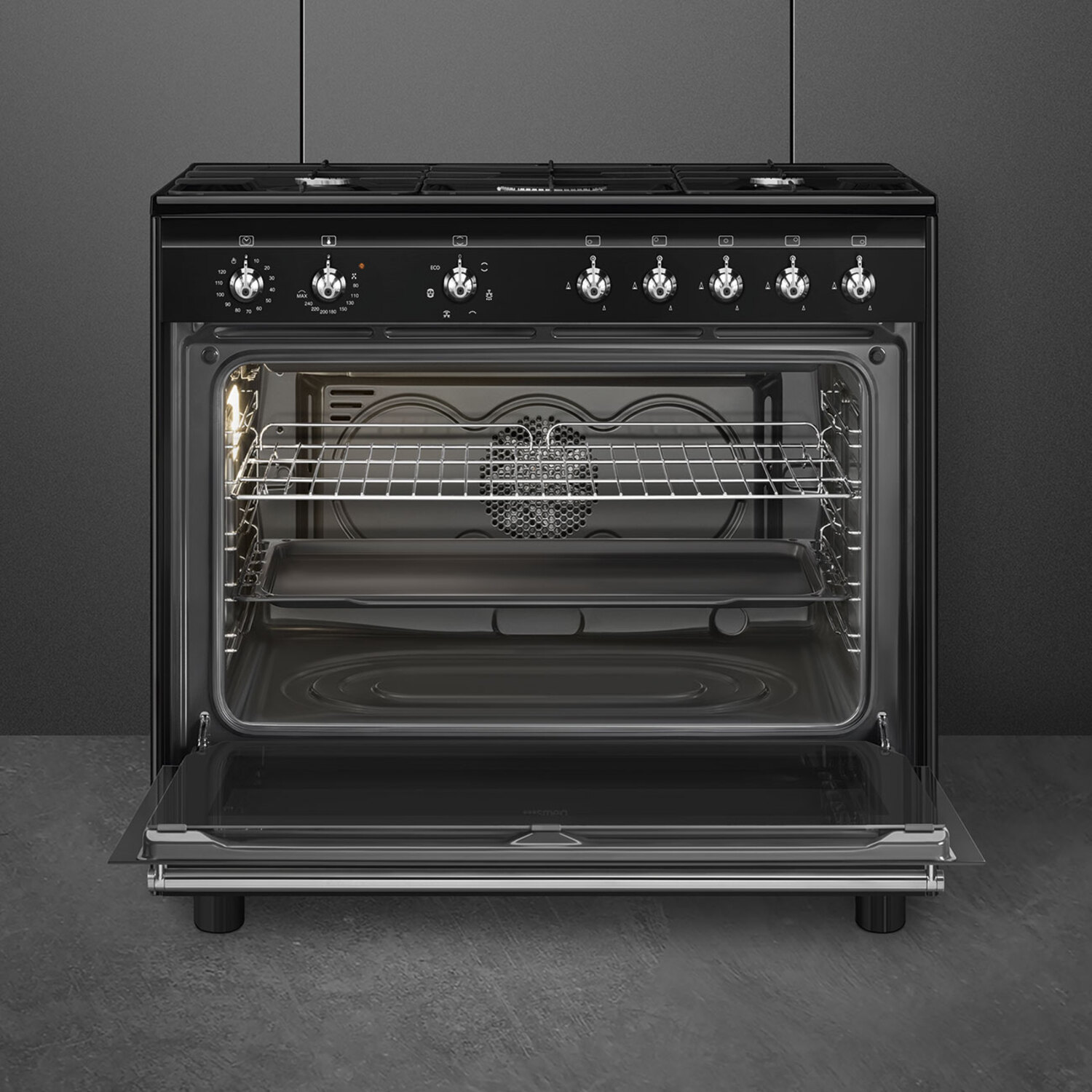 Black stove with the oven door open.