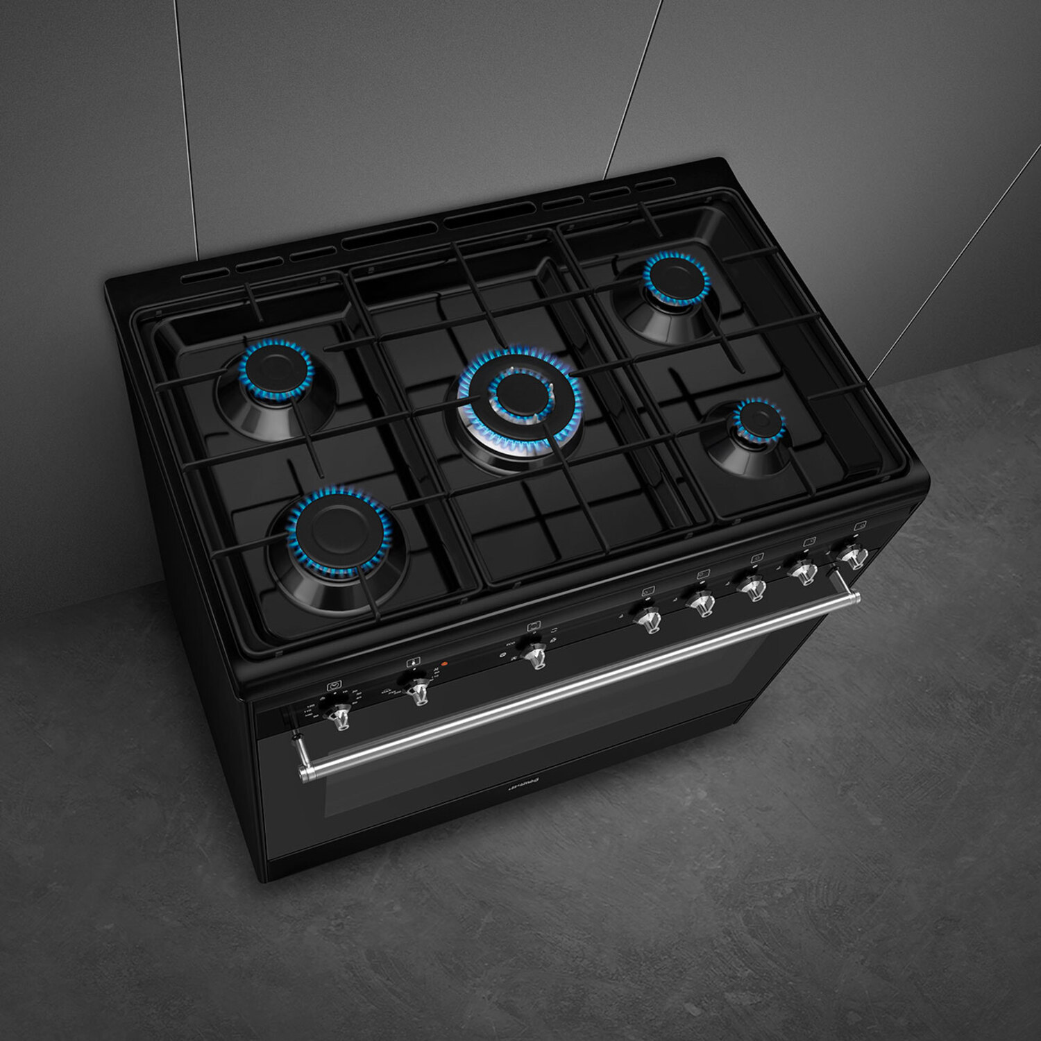 Black stove top with blue flames.