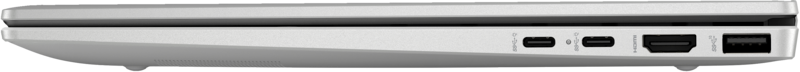 Laptop oldalsó nézet, ezüst színű, több porttal, mint például USB-C, HDMI és USB.