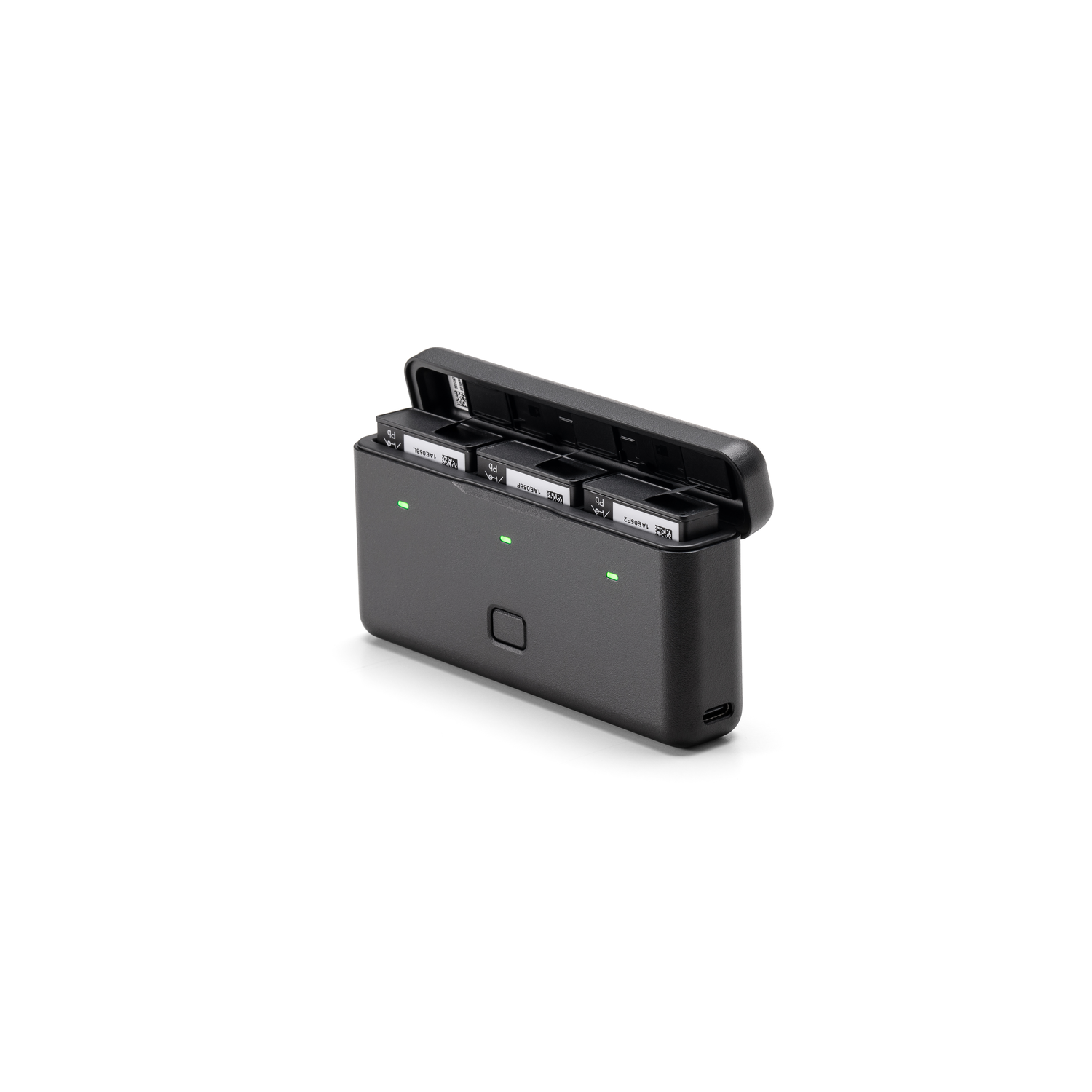 Une station de charge pour batteries, avec 3 batteries à l'intérieur et des lumières vertes.