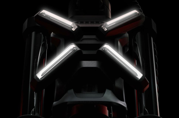 Appareil noir avec des lumières vives. Accents rouges. Design futuriste.
