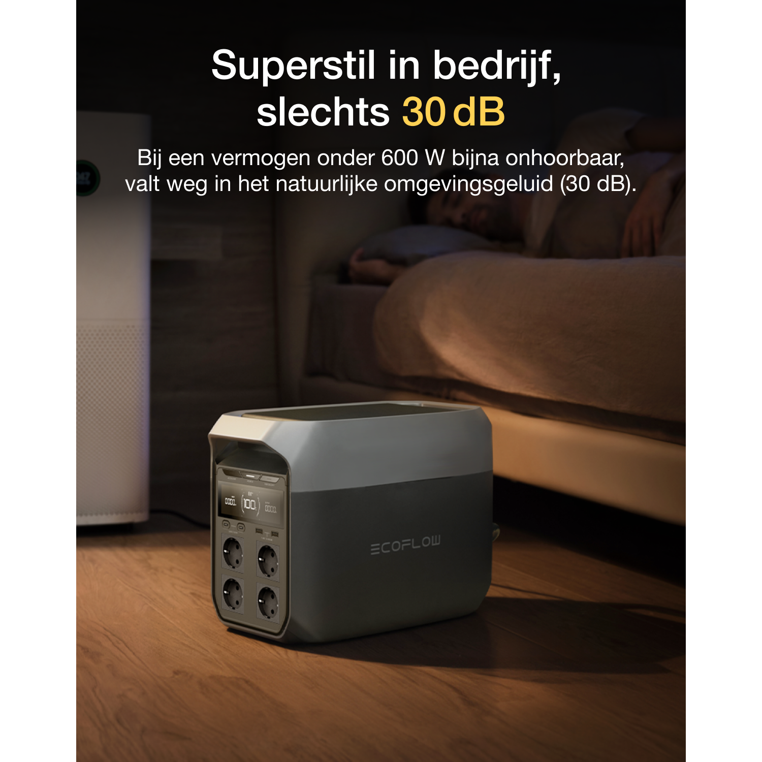 A black and gray appliance on a wooden floor, text labels the product.