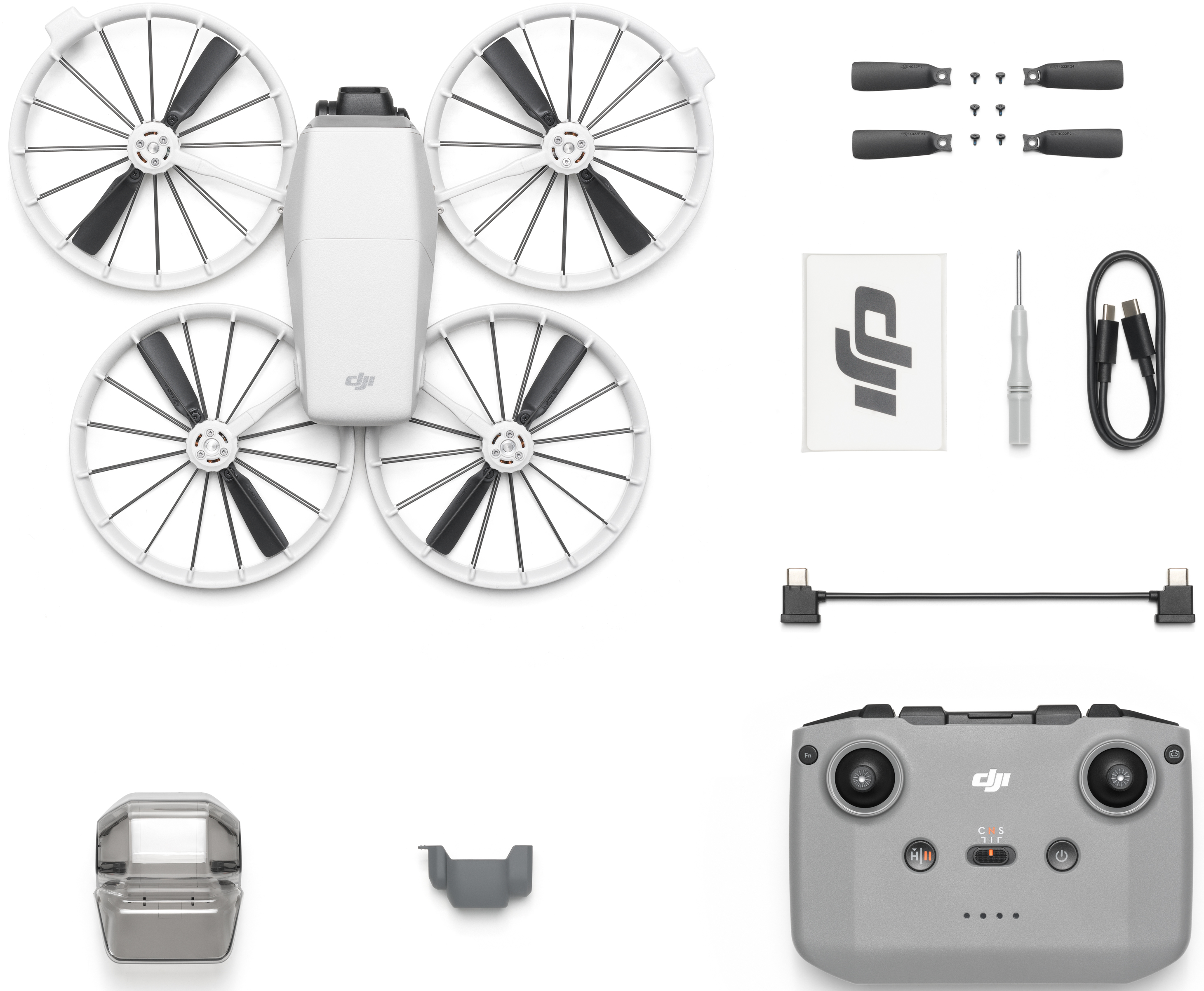 Drohne und Zubehör: Controller, Propeller, Aufkleber, Schraubendreher, Kabel und Abdeckung.