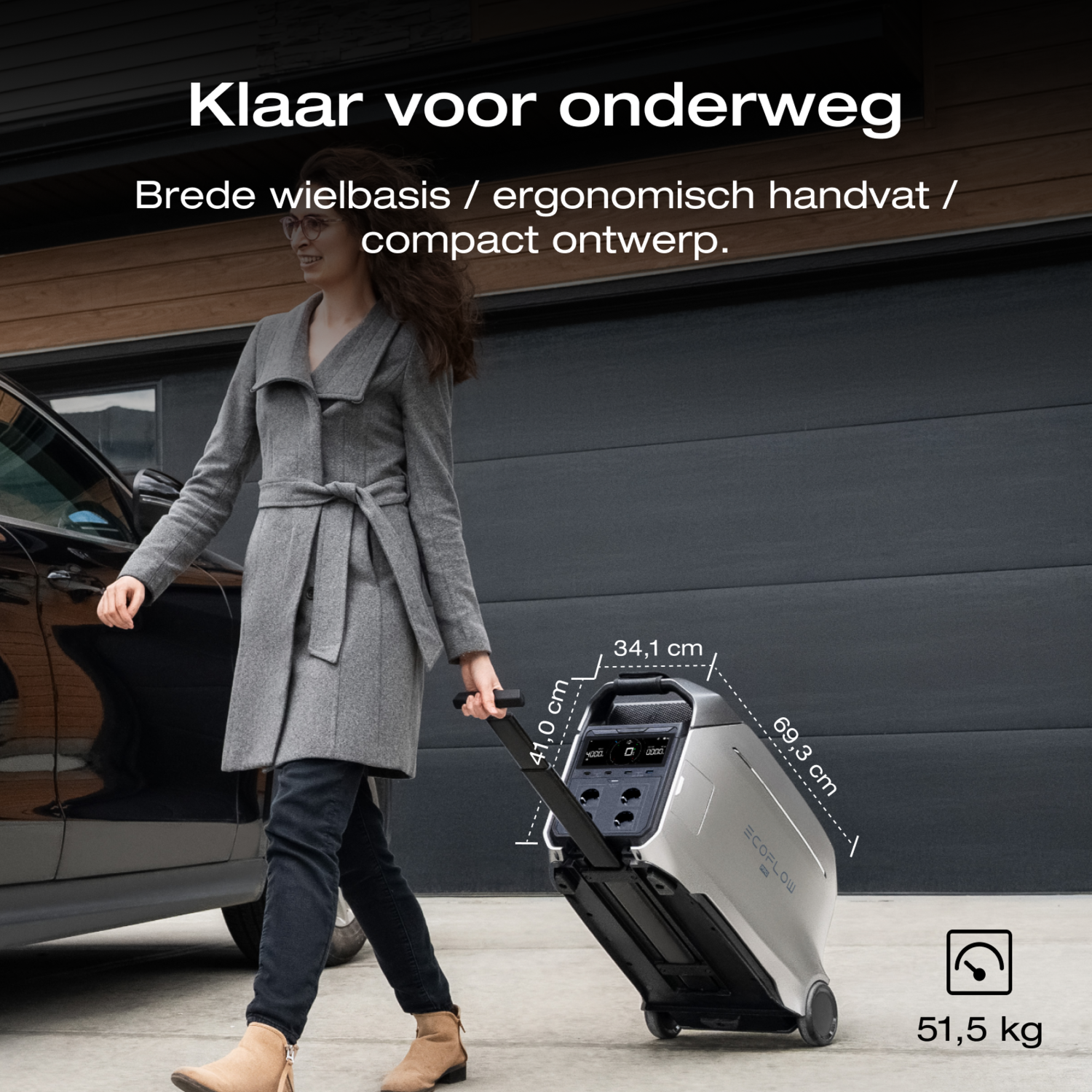 Woman pulling a silver portable power station on wheels. Text in Dutch includes dimensions and weight (51.5 kg).