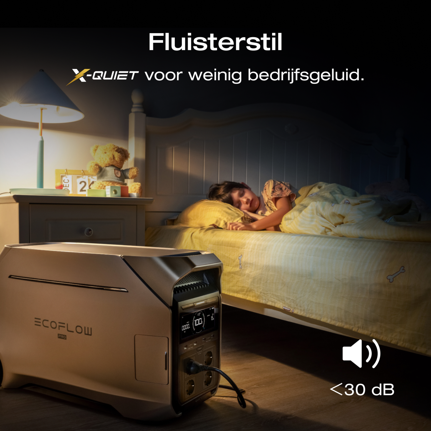 A child sleeping in a bedroom. A power station is in the foreground. Text says 'X-QUIET' and '<lt/>30 dB'.