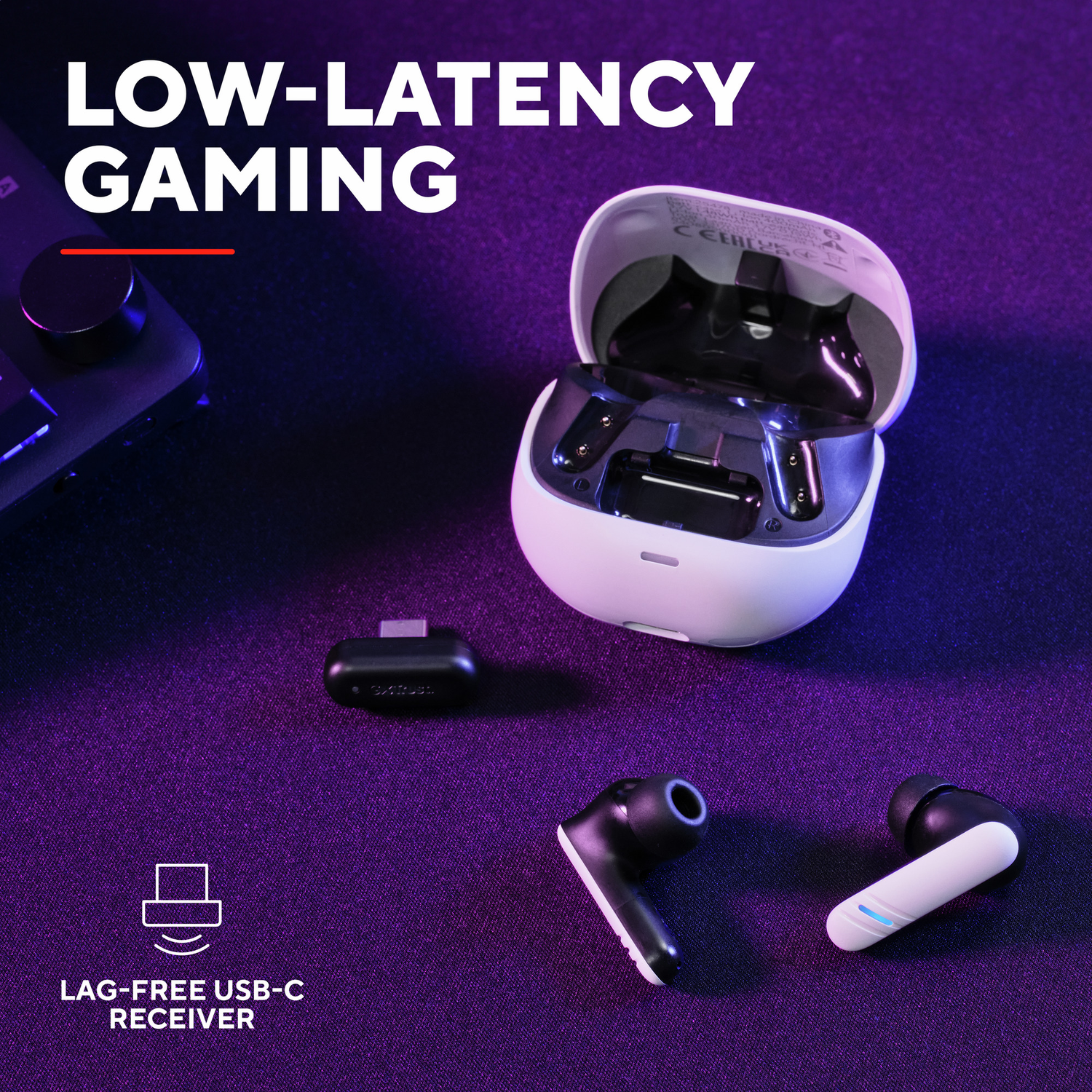 Earbuds, charging case, and USB-C receiver on a purple surface. Text: Low-Latency Gaming, Lag-Free USB-C Receiver.