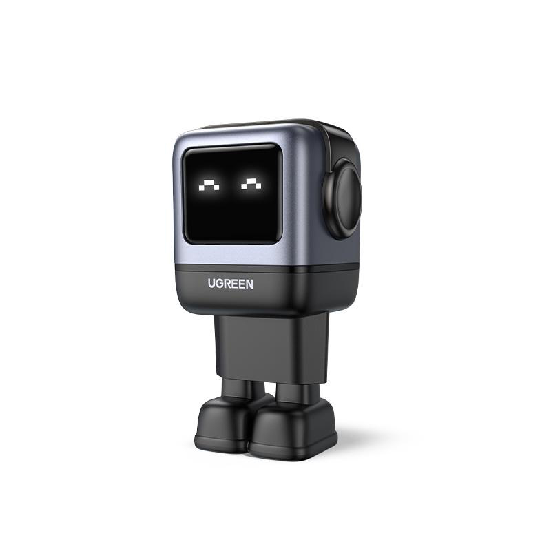 Ein UGREEN Roboter-Ladegerät mit einem Bildschirm, der pixelige Augen zeigt, in Schwarz und Grau.