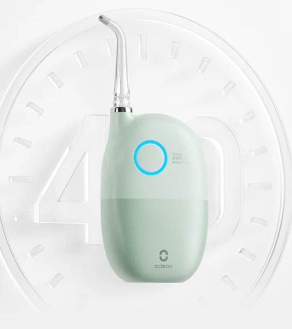 Zielony i biały irygator na przezroczystej powierzchni z numerem 40.