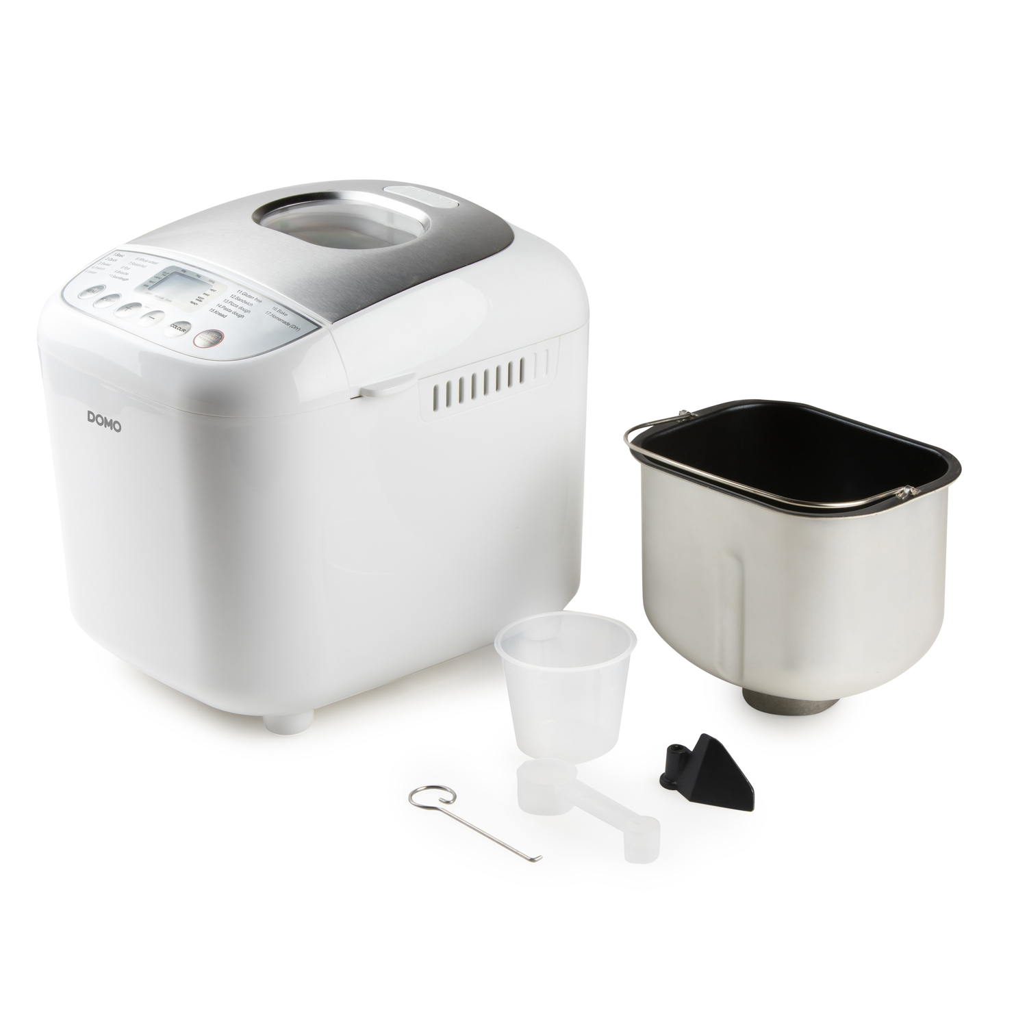 White bread maker with detached container, measuring cup, spoon, and blade on a white background.