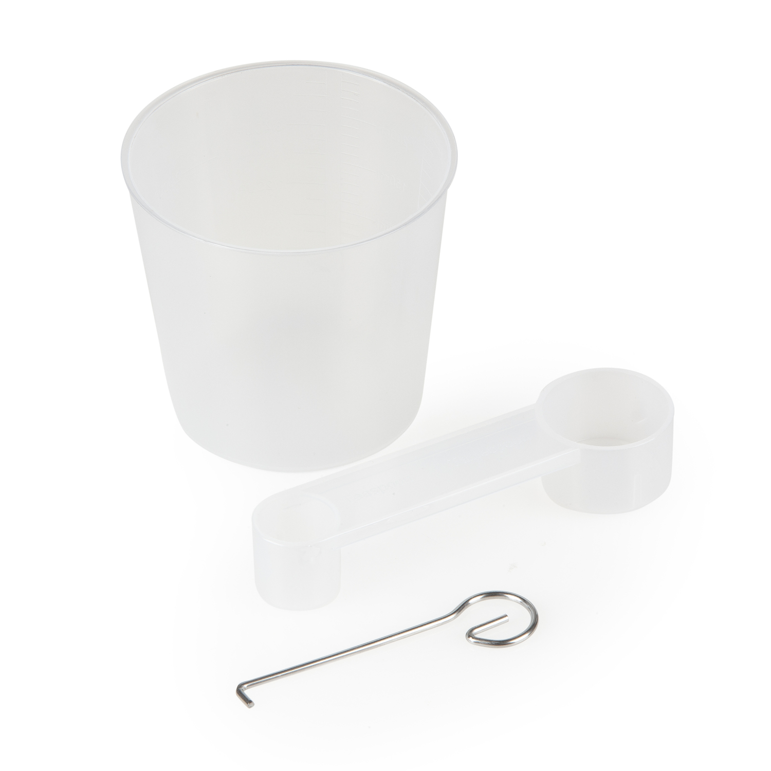 A clear plastic cup, a spoon, and a metal hook on a white surface.