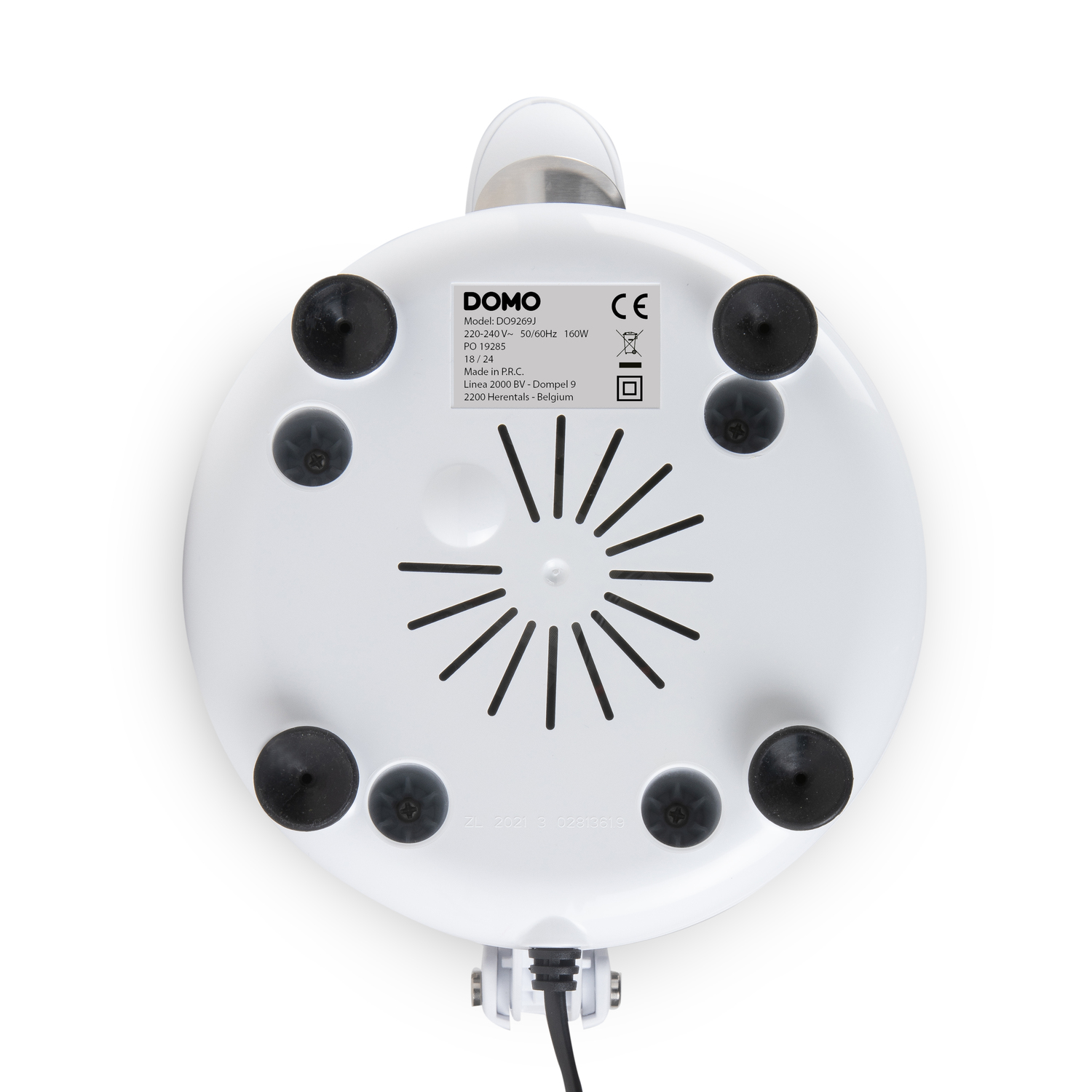The bottom of the white juicer, showing black suction cups and a power cord.