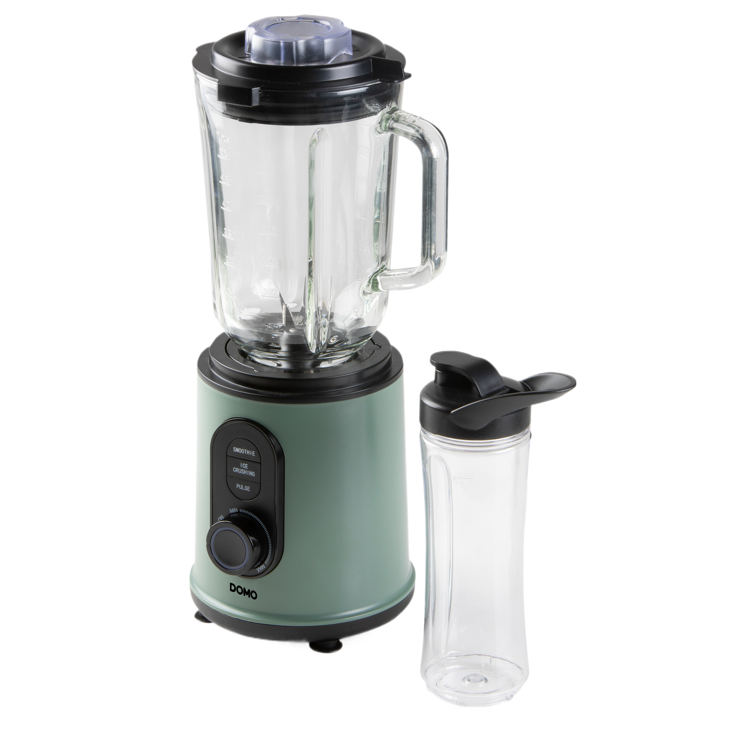 Un mixeur vert avec un bocal en verre et une bouteille noire séparée. Le mixeur est sur une surface noire.