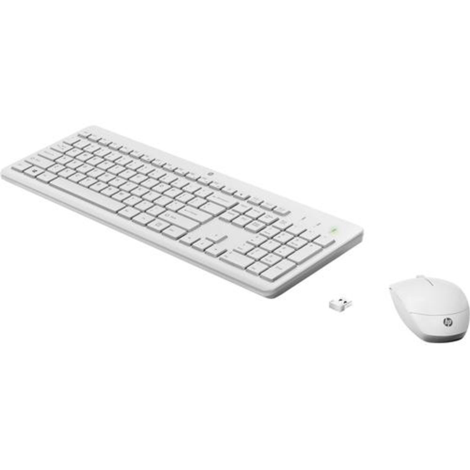 White keyboard and mouse set. Wireless design. The mouse is to the right.