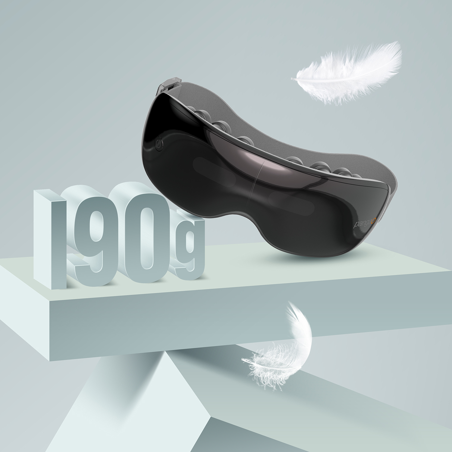 Black eye massager with feathers and 190g text. Shows the product's light weight.