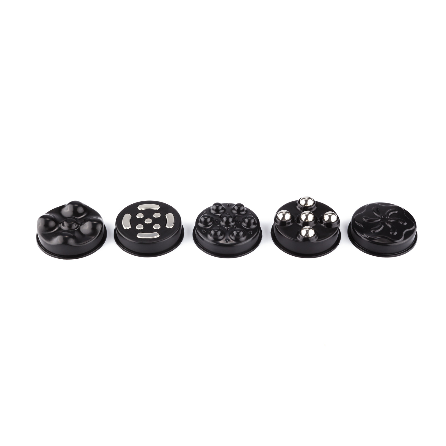 Variety of black massage heads. All in different shapes and sizes.