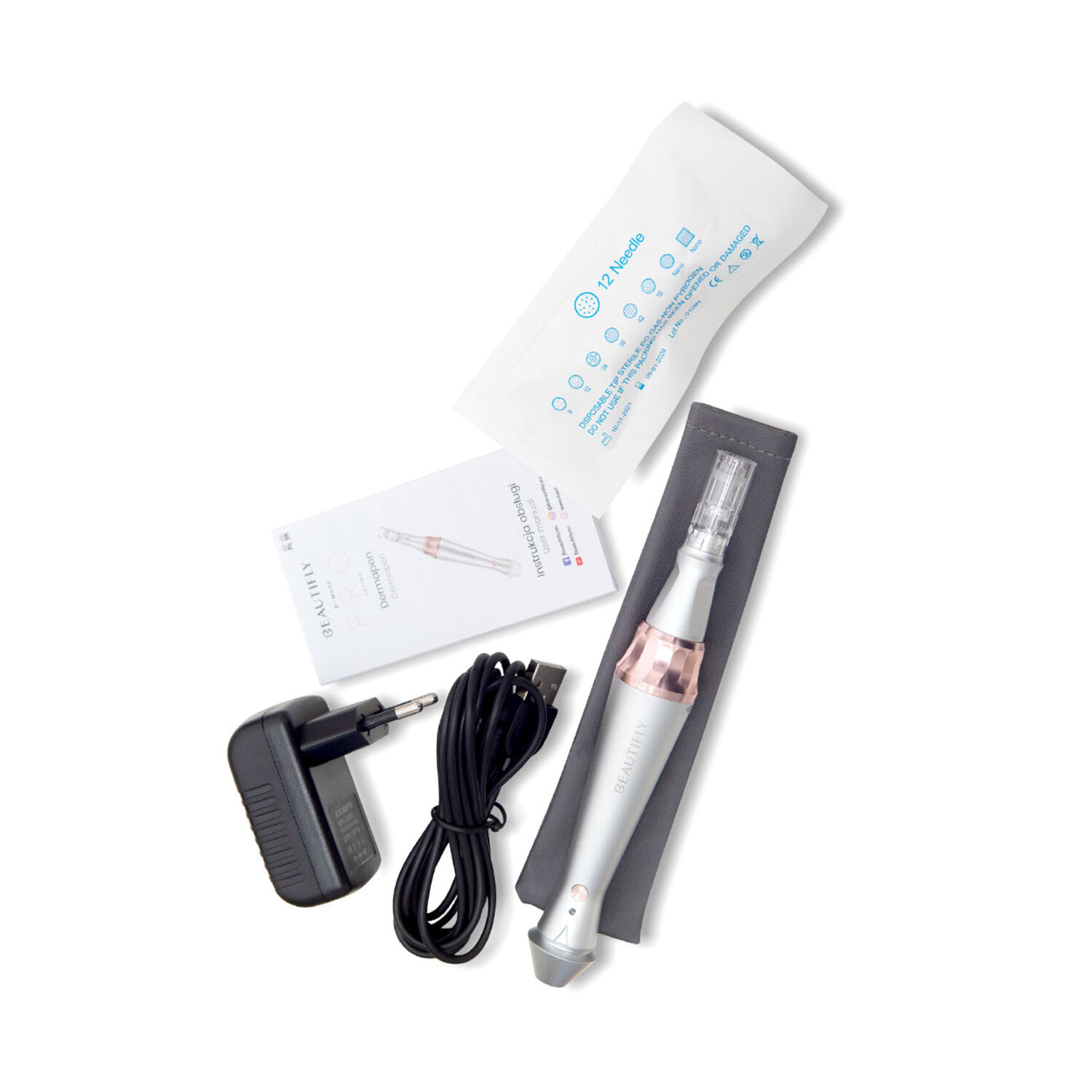 Accessoires voor huidverzorgingsapparaten, waaronder naalden, een voedingsadapter en een USB-kabel.