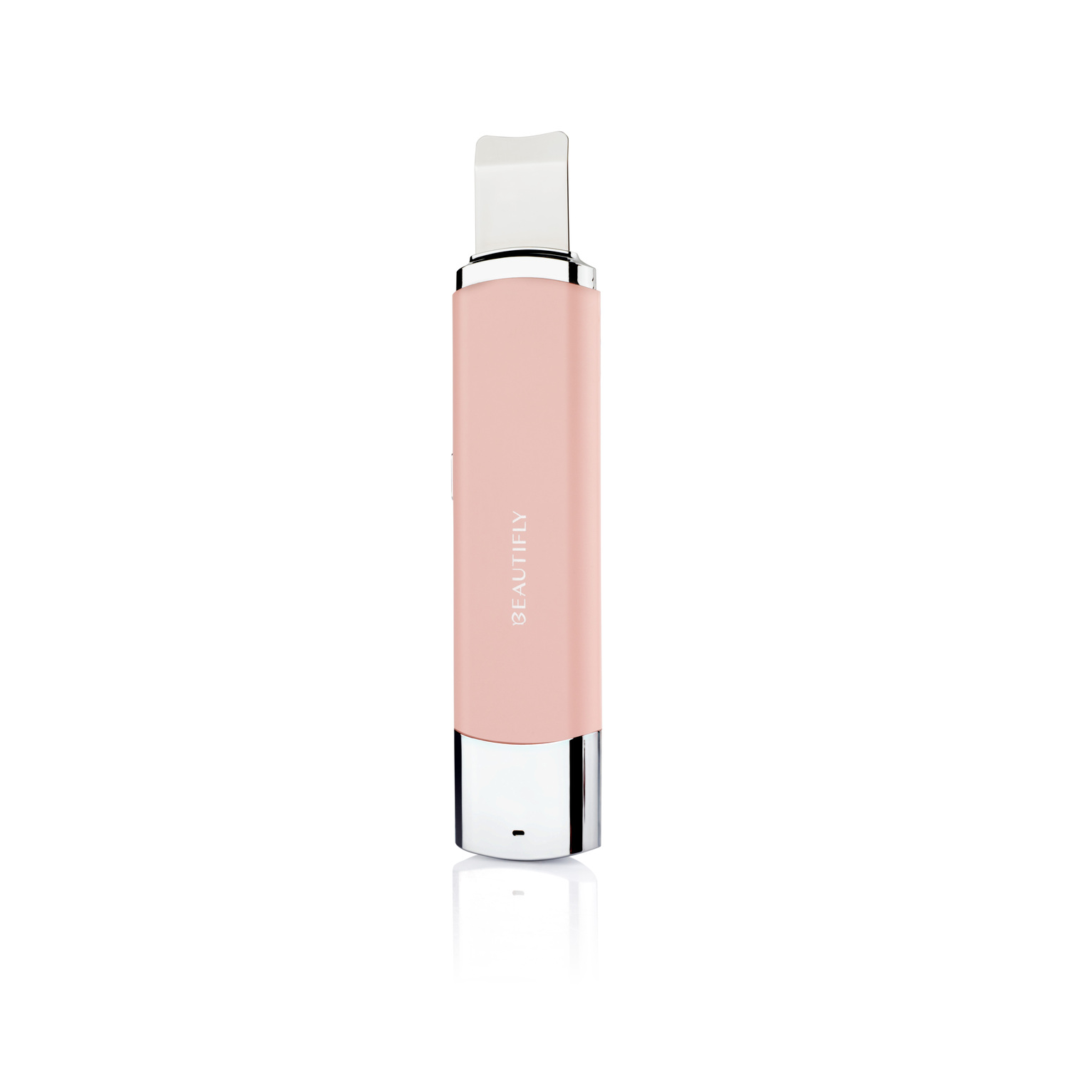 A pink and silver Beautifly face cleaning device on a white surface.
