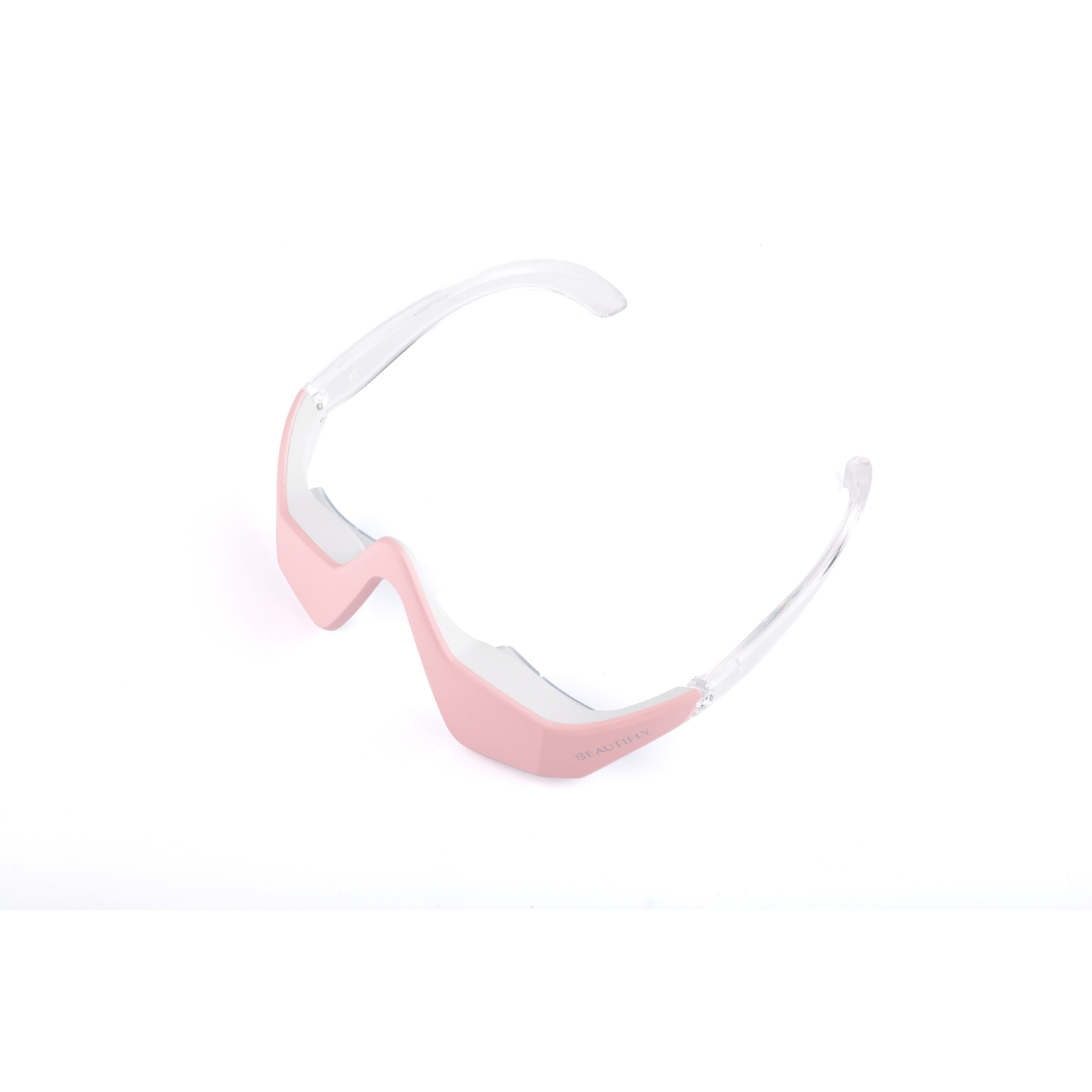Pink eye massager glasses on white background. Transparent temples. 
