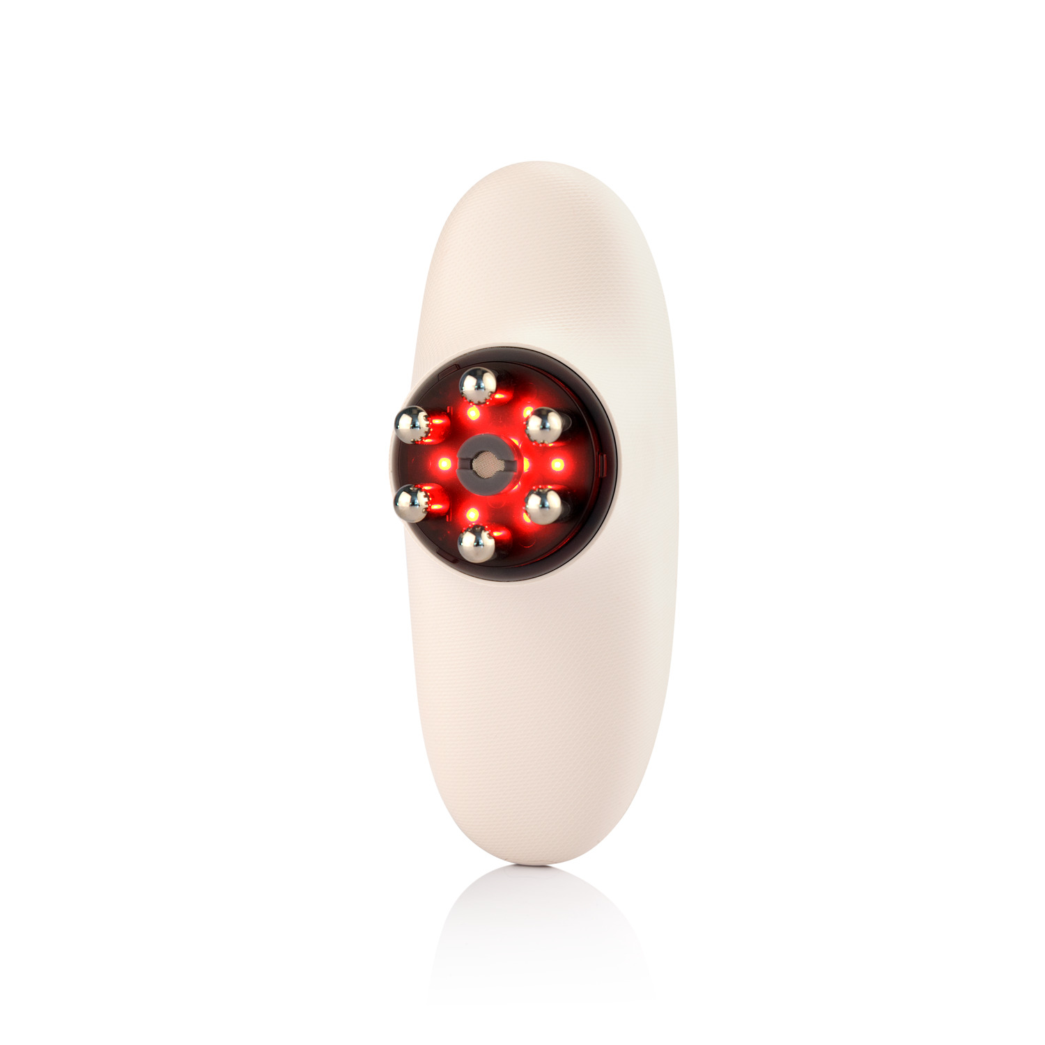Witte gezichtsmassager met rode lampjes omringd door zilveren bollen.