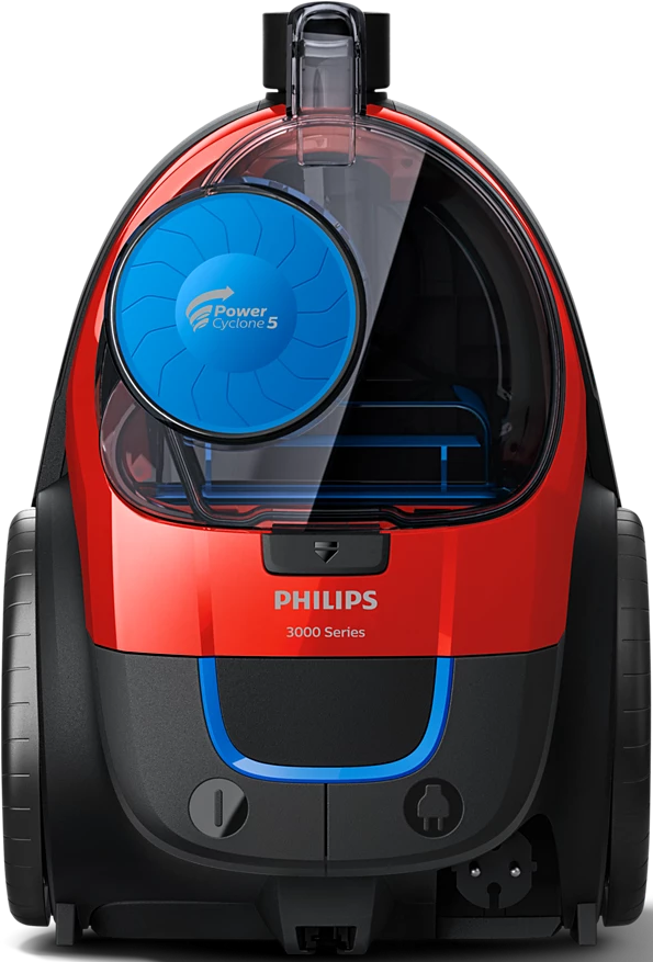 Aspirateur rouge et noir avec des accents bleus, un compartiment à poussière transparent et des roues.