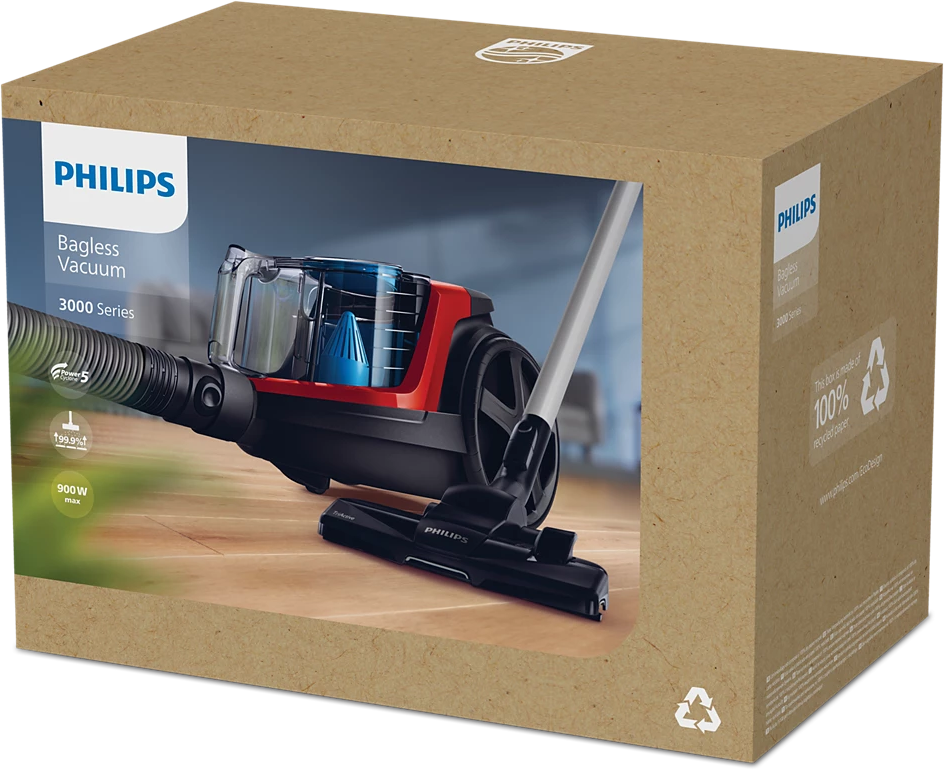 Aspirateur sans sac Philips en boîte. Il est rouge et noir. La boîte est marron.