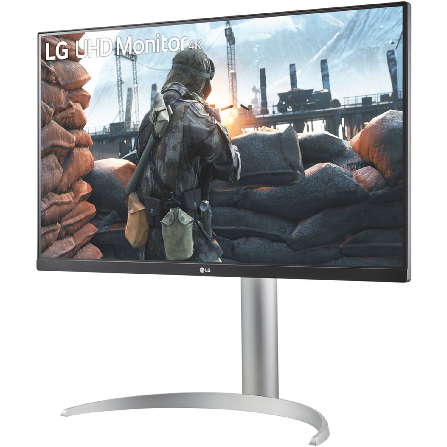 An LG 4K monitor displays a war scene. A soldier is in the foreground. The monitor has a silver stand.