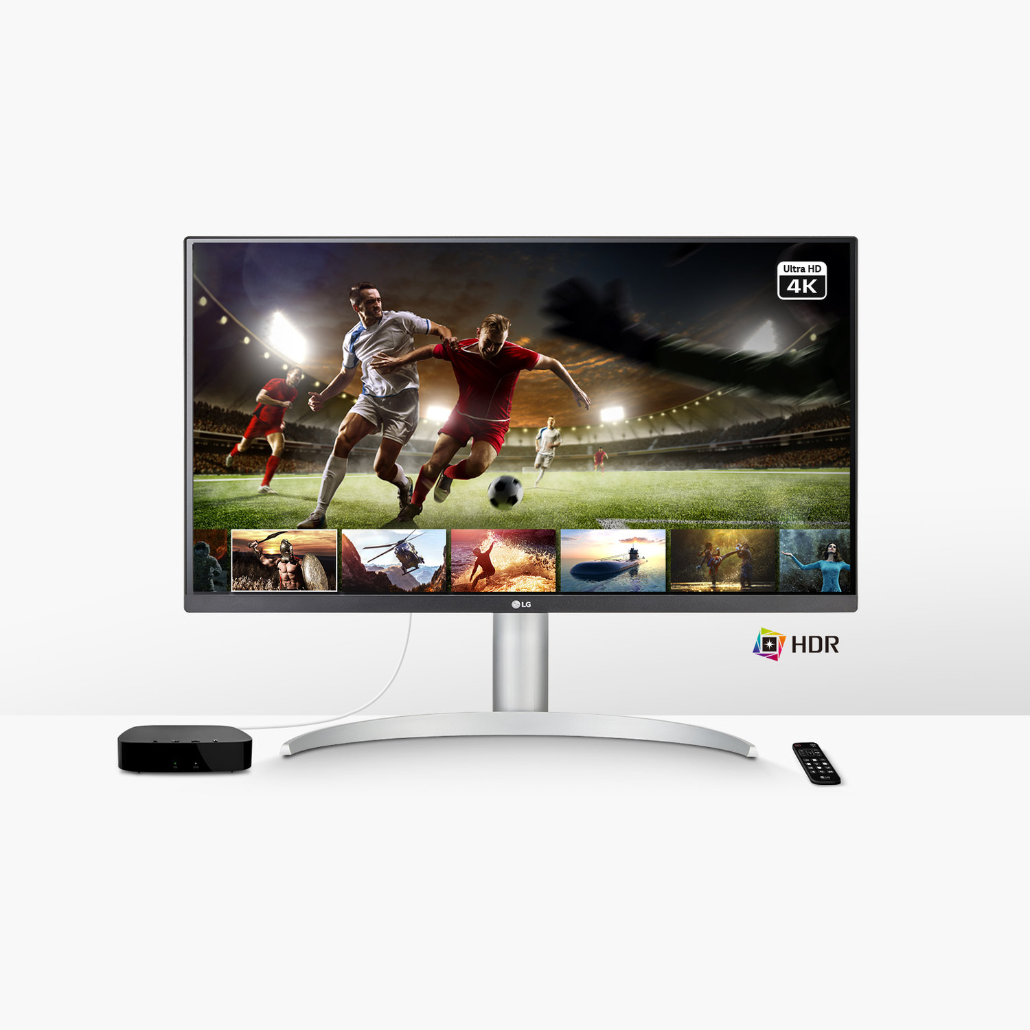 A television screen displaying a soccer game, next to a media player and remote.