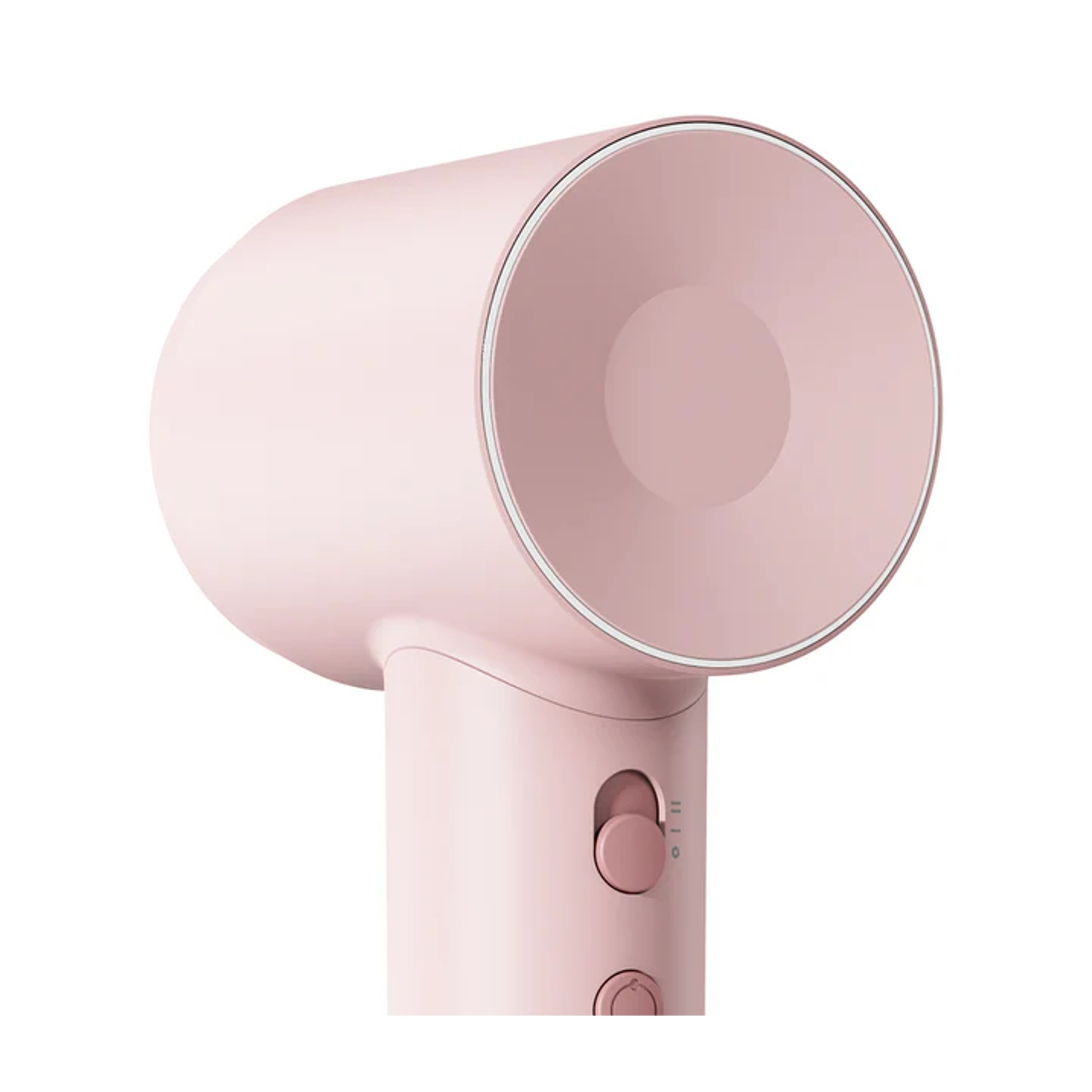 Primo piano di un asciugacapelli rosa che mostra la testa rotonda, i pulsanti e la manopola.