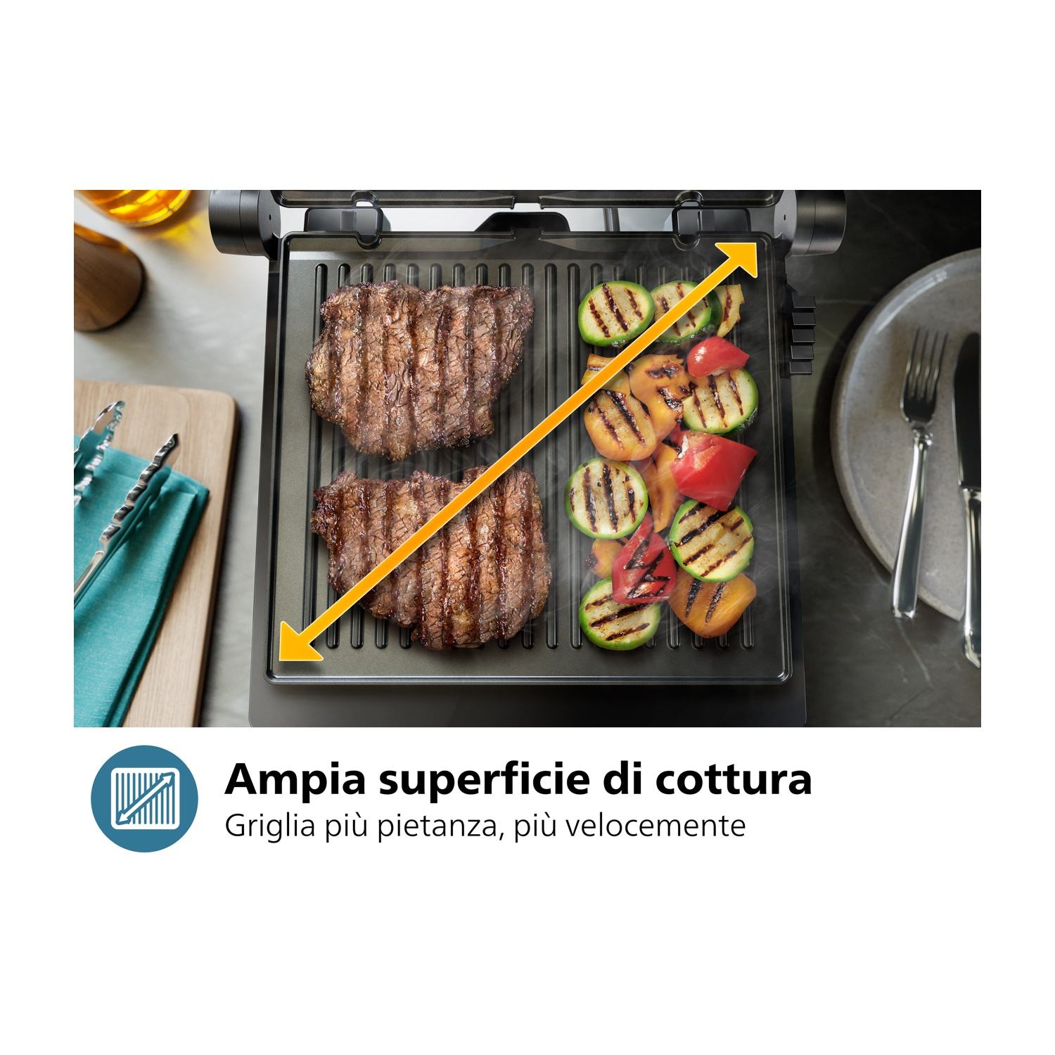 Griglia con bistecche e verdure. Freccia gialla indica l'area di cottura. Sfondo bianco.