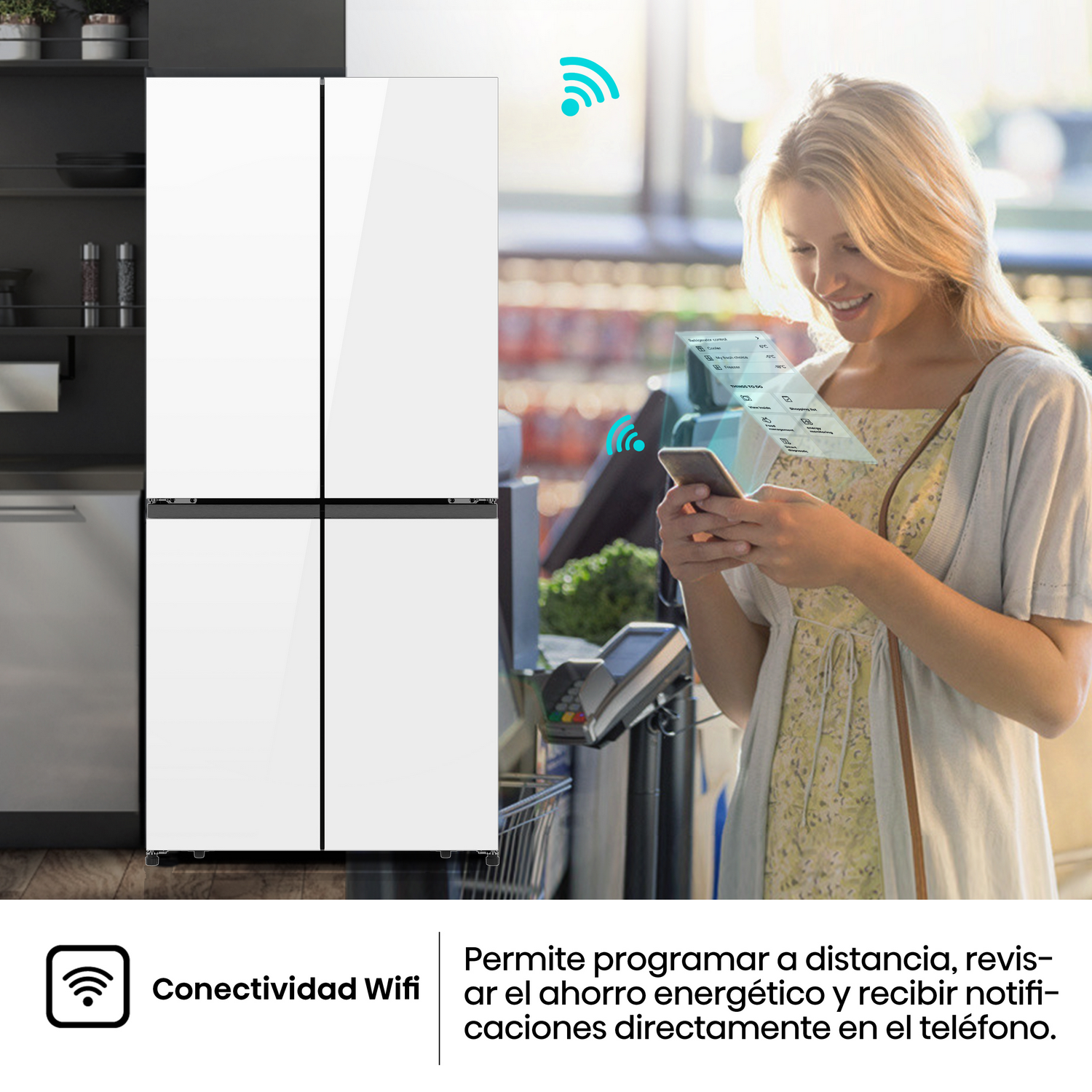 Frigorífico blanco con cuatro puertas. Una mujer sostiene un teléfono, mirando funciones inteligentes.