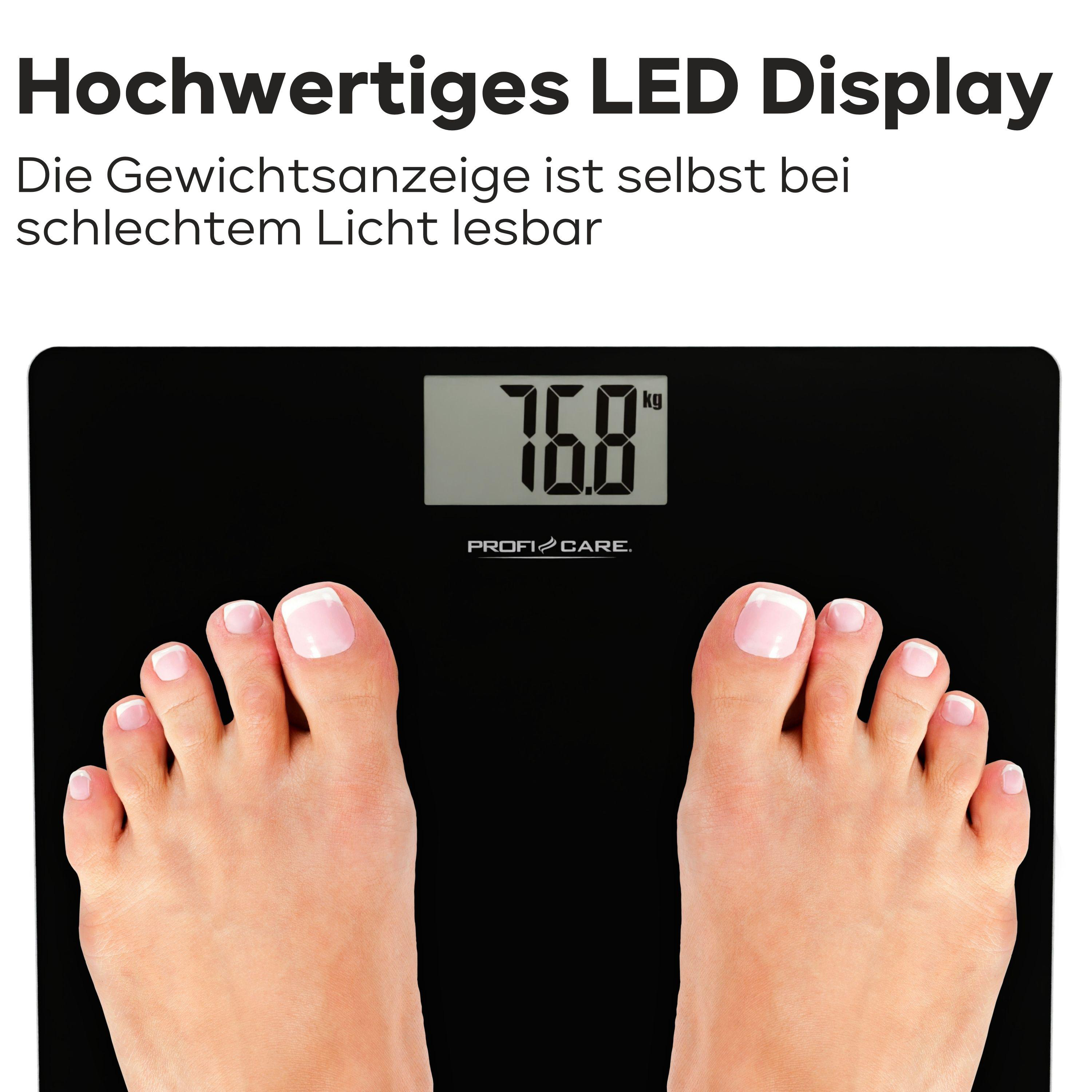 Schwarze Digitalwaage mit Füßen, die 76,8 kg anzeigen.