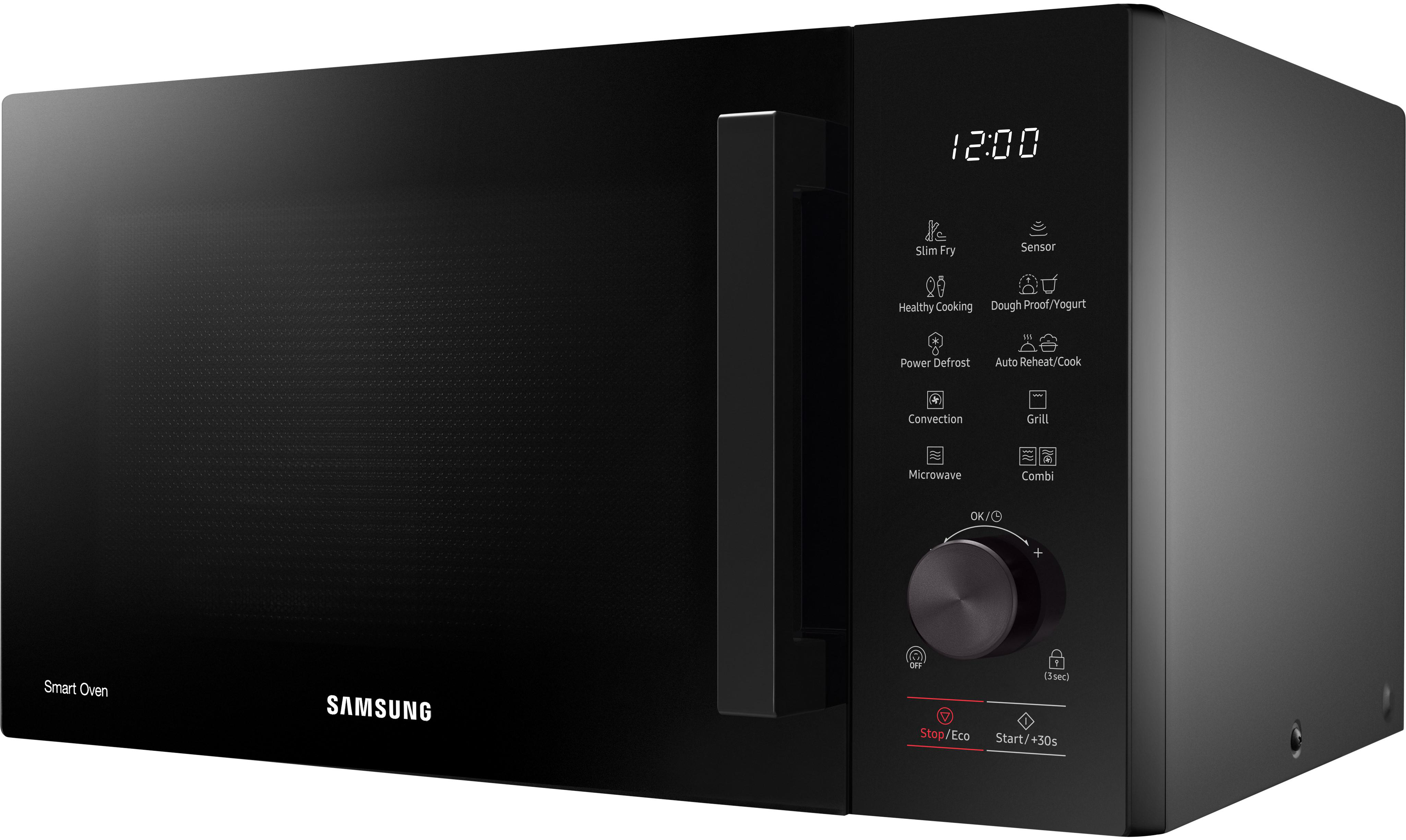 Eine schwarze Mikrowelle mit Bedienfeld und geschlossener Tür, die 12:00 Uhr anzeigt.