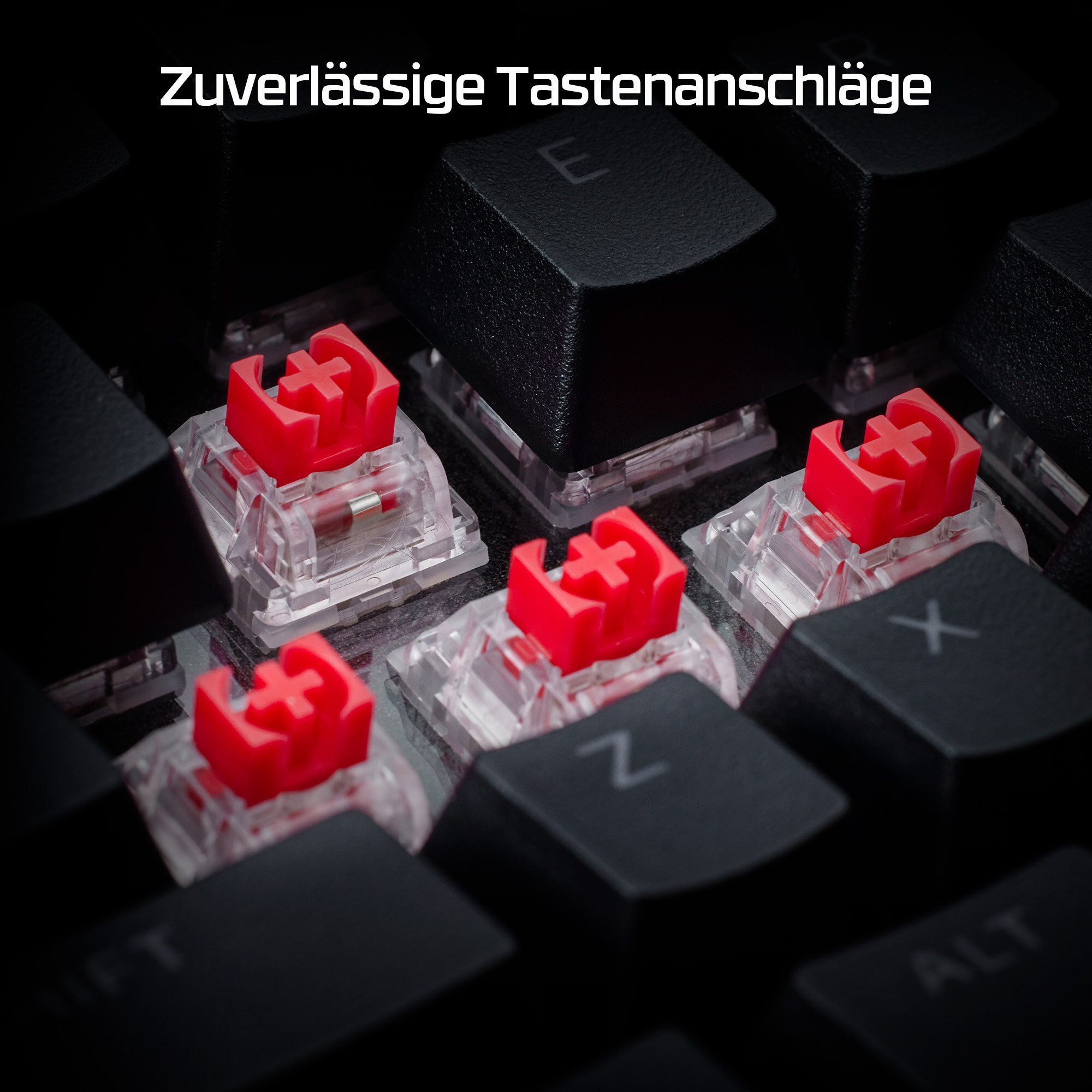 Nahaufnahme von roten mechanischen Tastaturschaltern. Schwarze Tasten und rote Schalter.