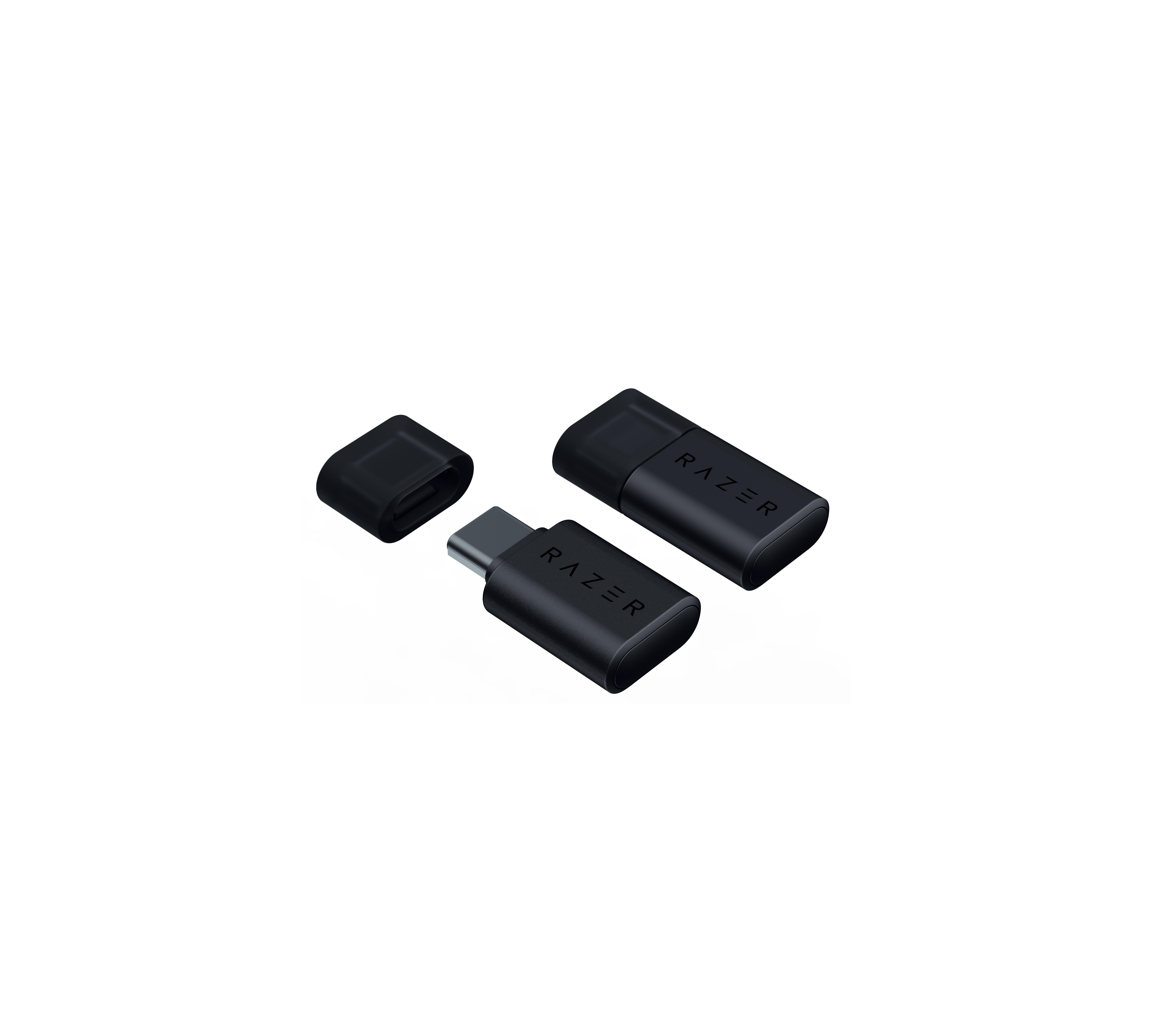 İki siyah Razer USB-C adaptörü, biri kapağı açık, beyaz bir yüzeyde.