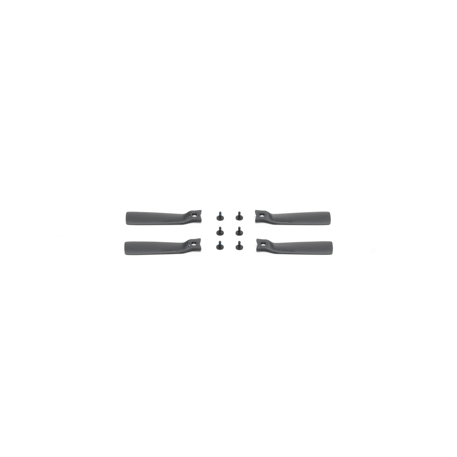 Four black drone propellers and screws on a white background, arranged in a symmetrical layout.