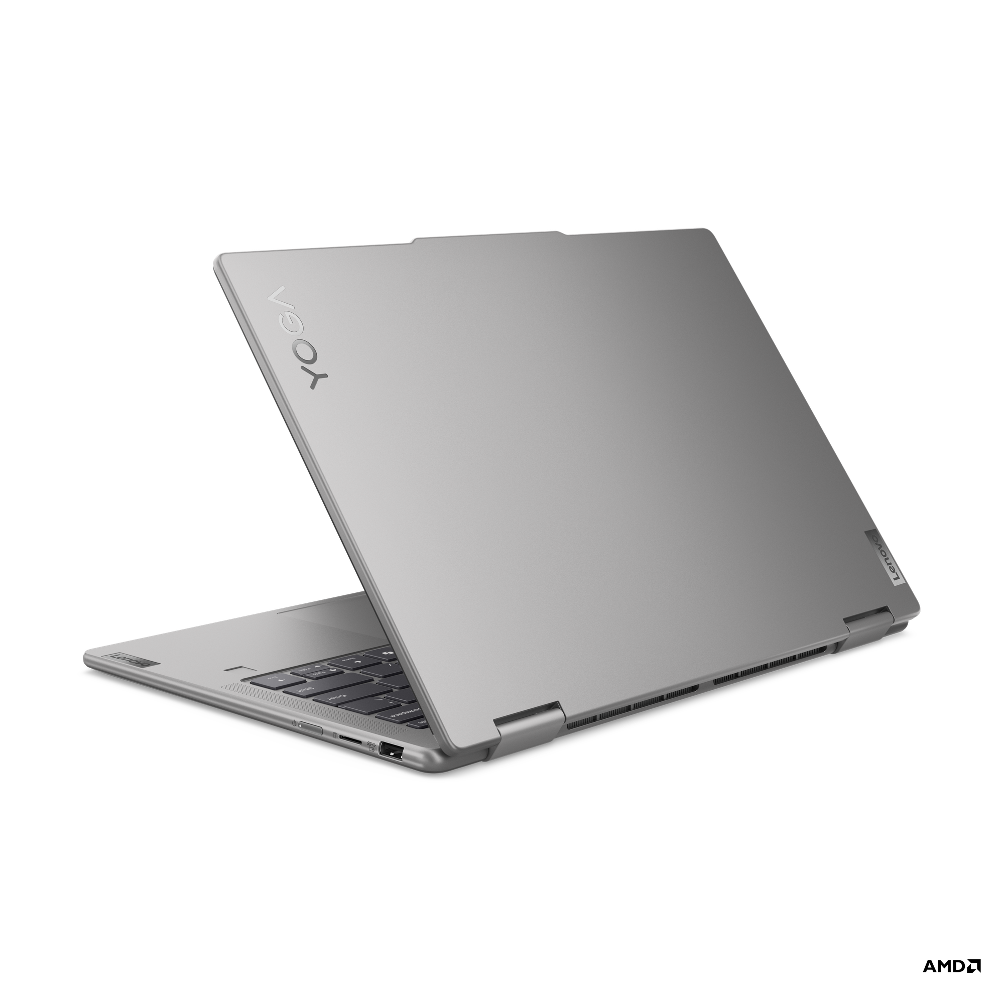 Gümüş Lenovo Yoga dizüstü bilgisayar, kapalı, arka görünüm, Yoga logosu ile, siyah arka planda.
