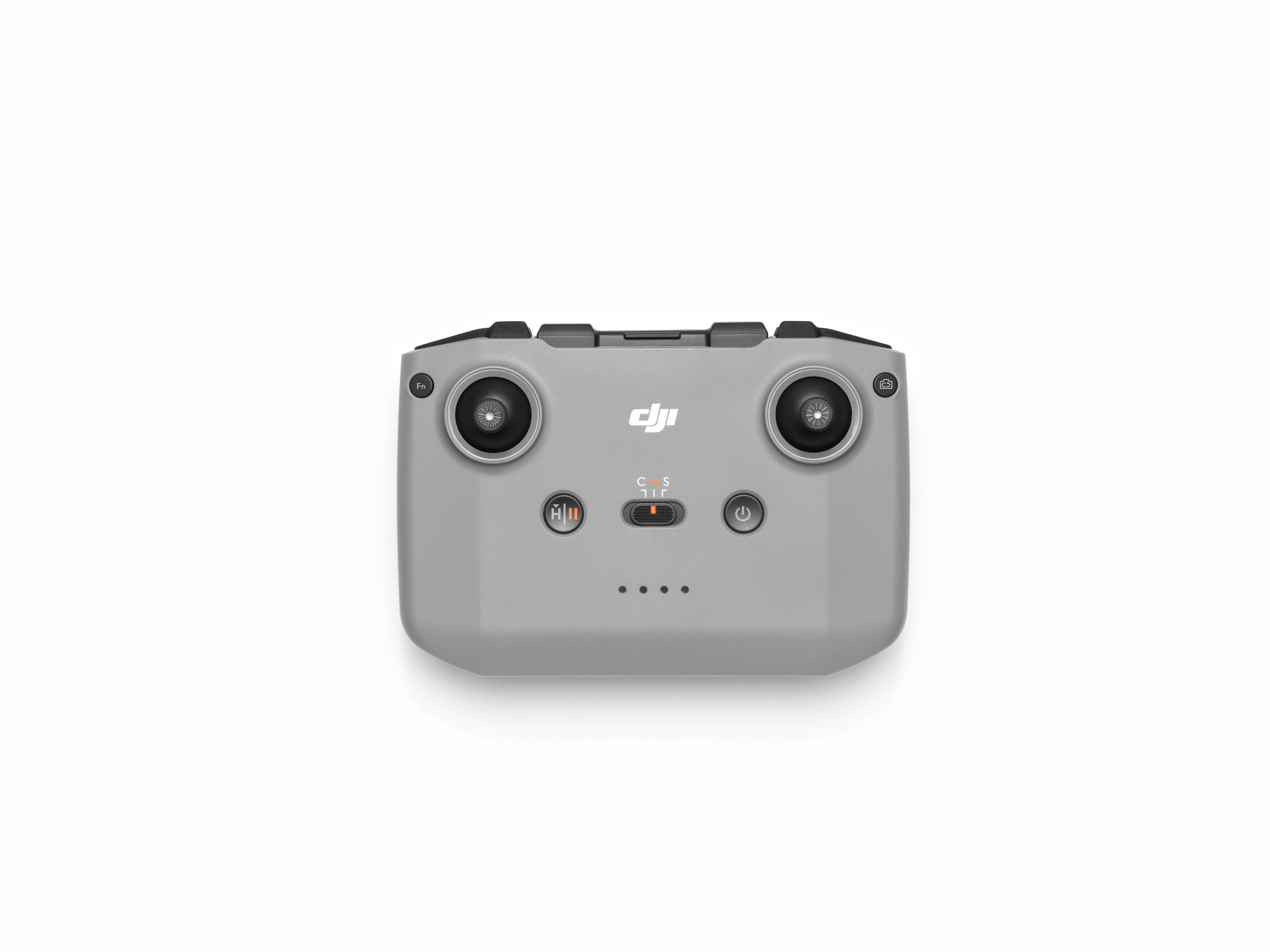 Grauer Drohnen-Controller mit zwei Joysticks, Knöpfen und einem Ein-Aus-Schalter.