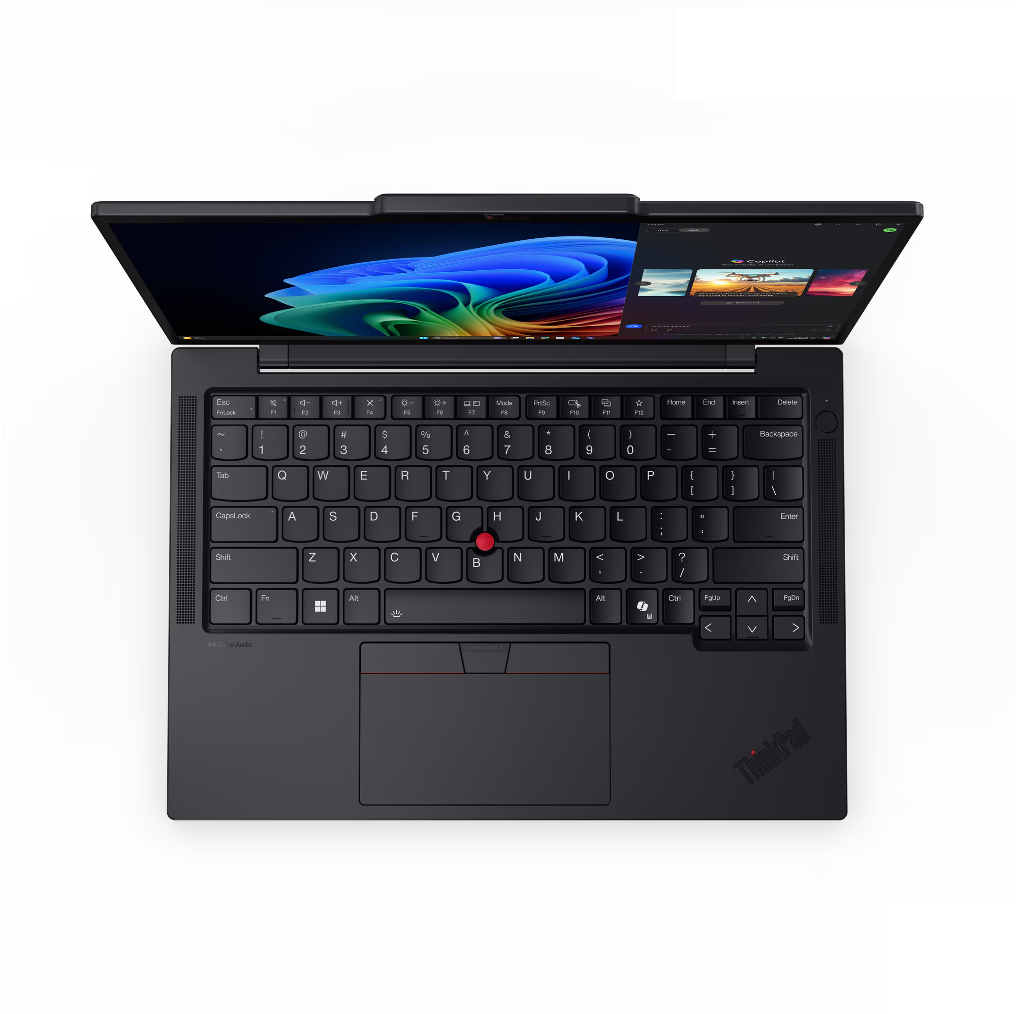 Portátil negro con pantalla abierta, mostrando panel Copilot y teclado.
