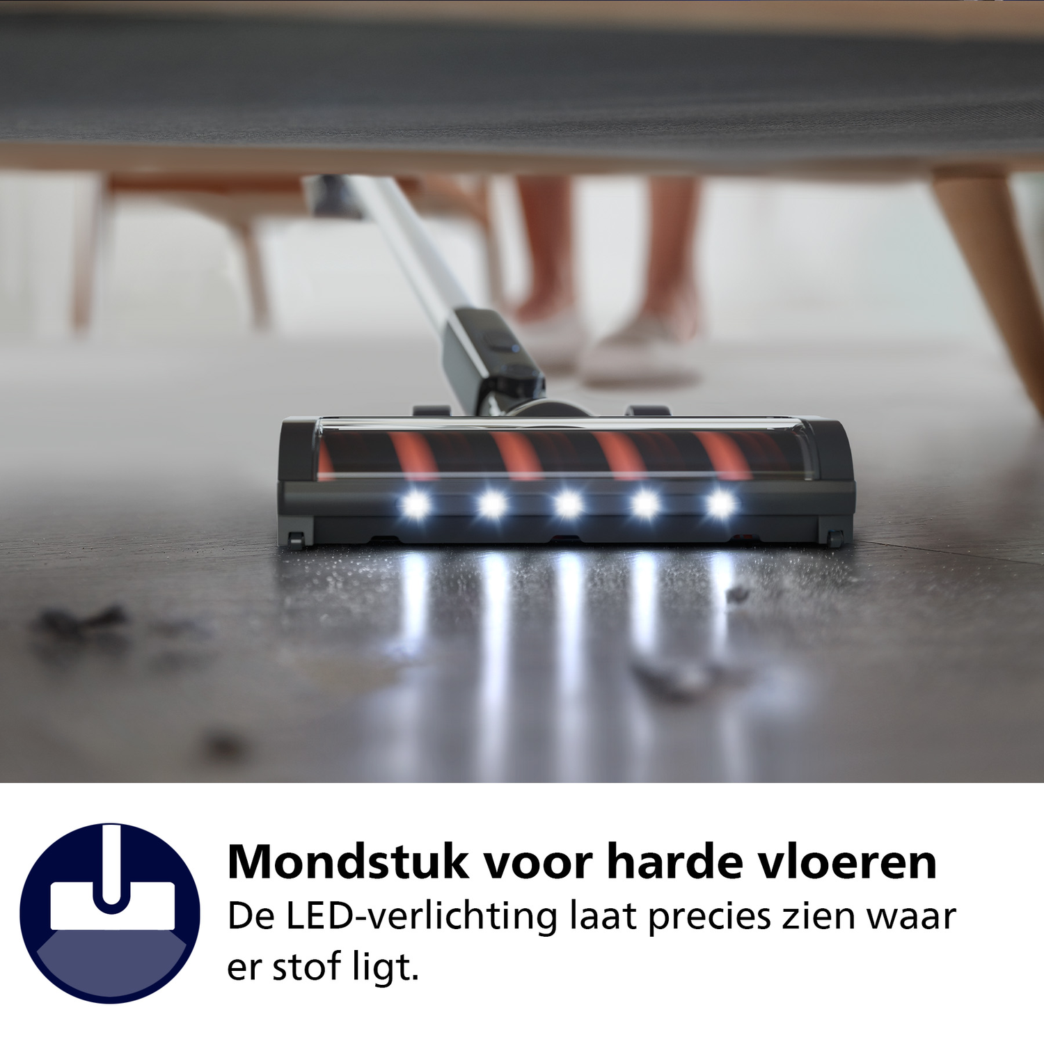 Stofzuigerkop met LED-verlichting die de vloer verlicht.
