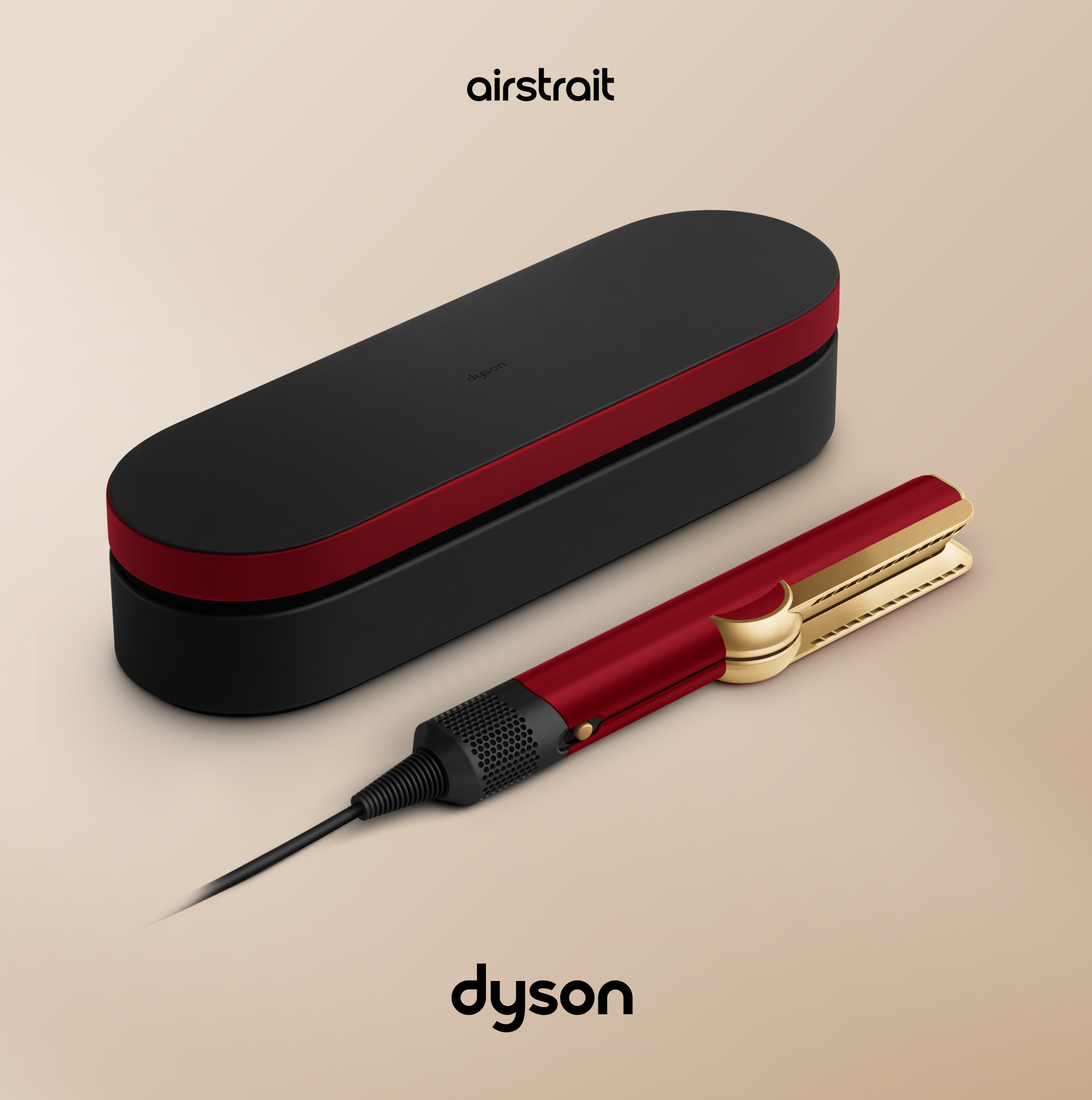 Een stijltang en etui in rood en zwart met het woord Dyson erop.