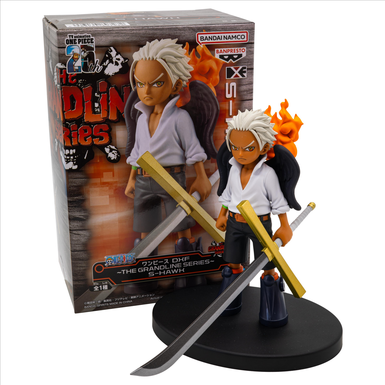 Figura de personaje con pelo blanco, espada y llamas, junto a caja. La caja muestra personaje similar.