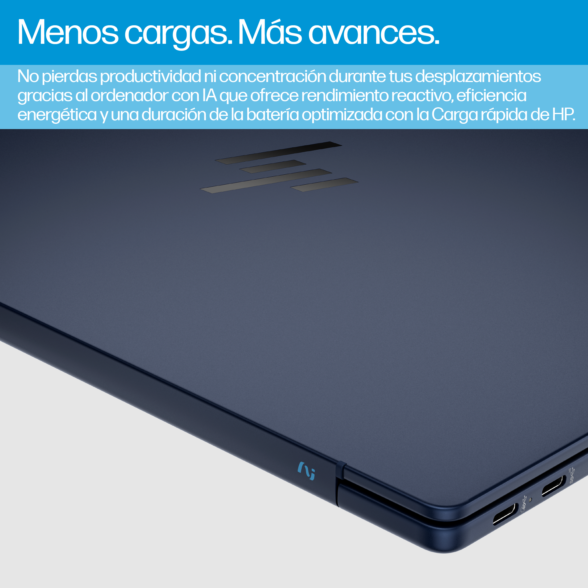 Una computadora portátil se muestra con texto en español. La computadora portátil es azul oscuro.