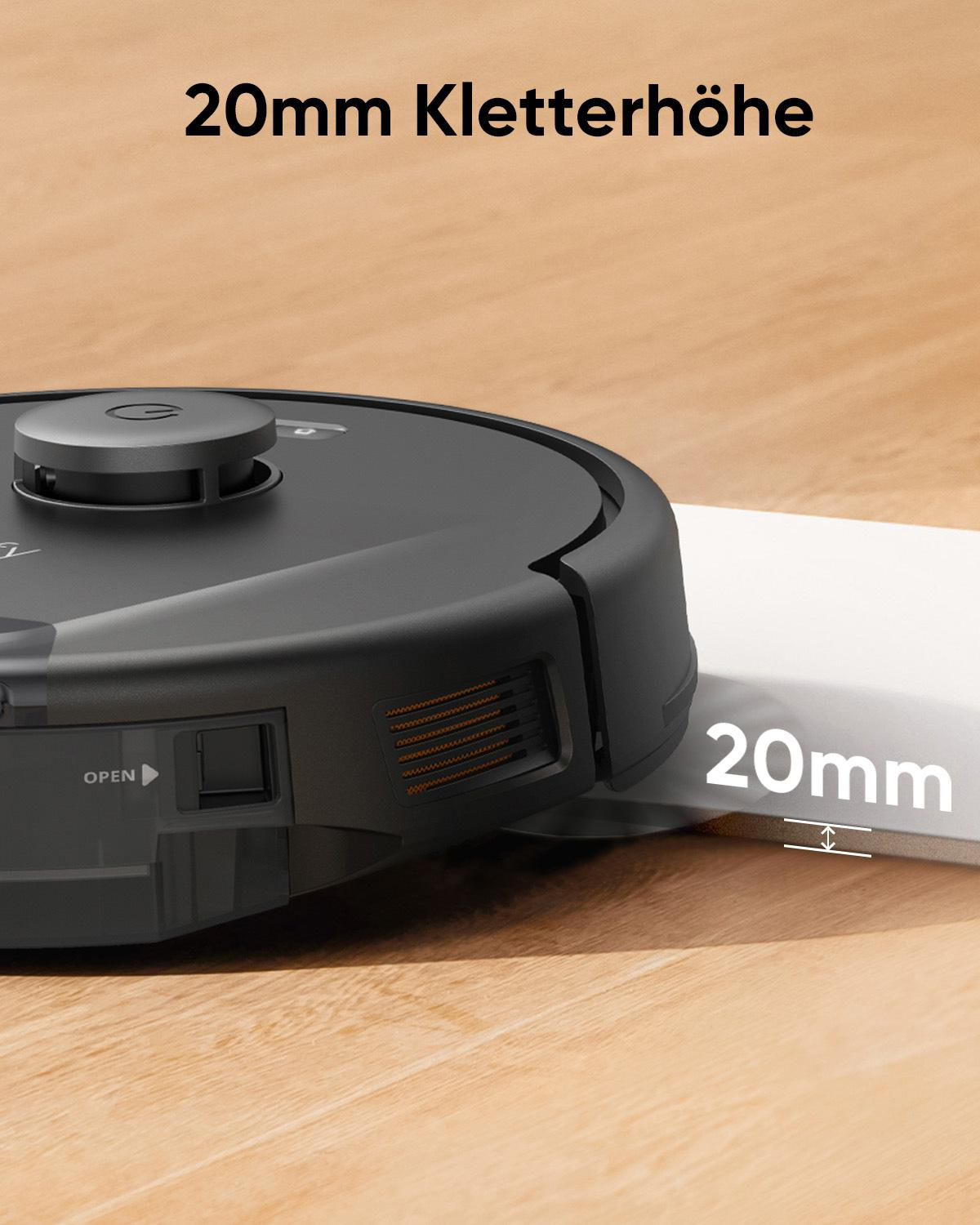Ein schwarzer Roboter-Staubsauger neben einem weißen Objekt. Der Text '20mm' befindet sich neben dem Objekt.