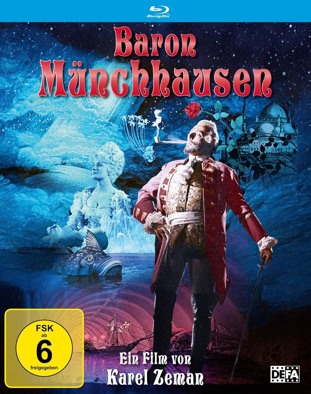 Filmplakat: Baron Münchhausen in rotem Mantel. Szene mit Meer, Frauenstatue, Schiff.